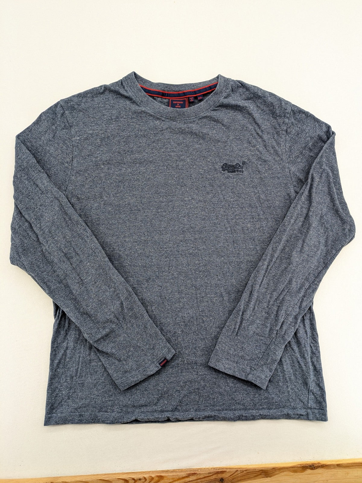 Superdry grey long sleeve shirt melange with embroidered logo and red collar accent.