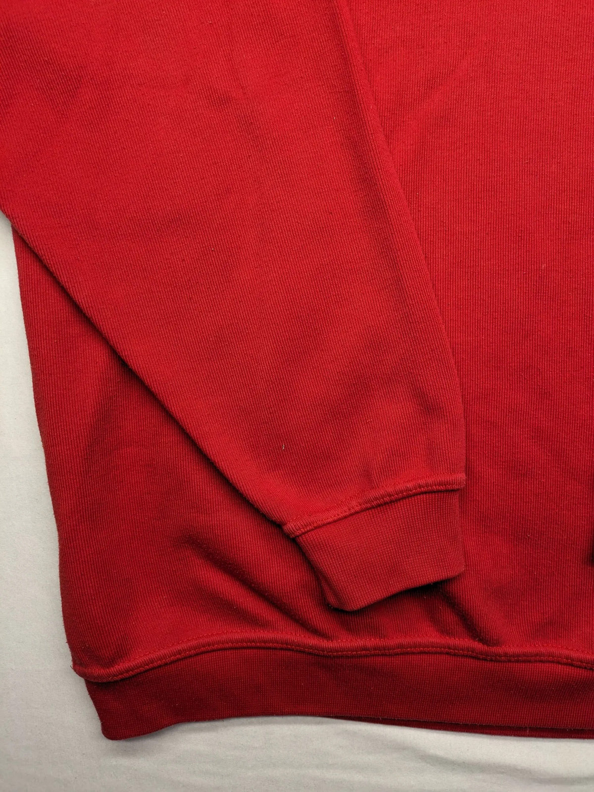 Wind Sportswear red turtle neck jumper with classic polo collar and zigzag stitching.