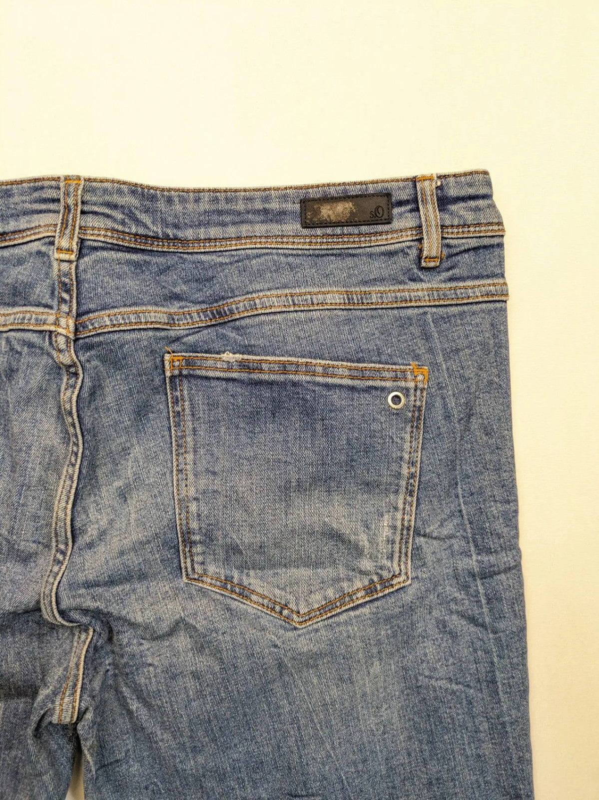 s.Oliver blue straight jeans with red and white side stripes, soft cotton blend material