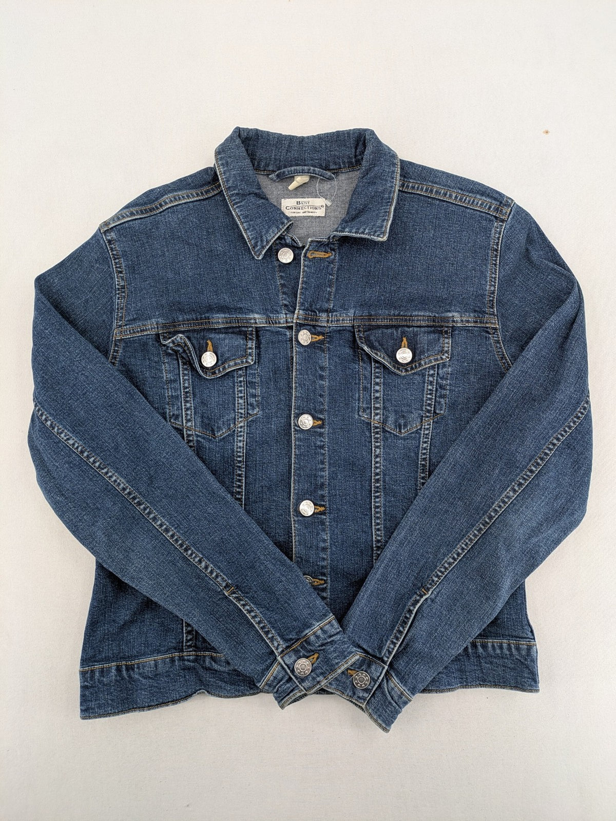 Best Connections cream denim jacket classic design with button placket and two chest pockets.