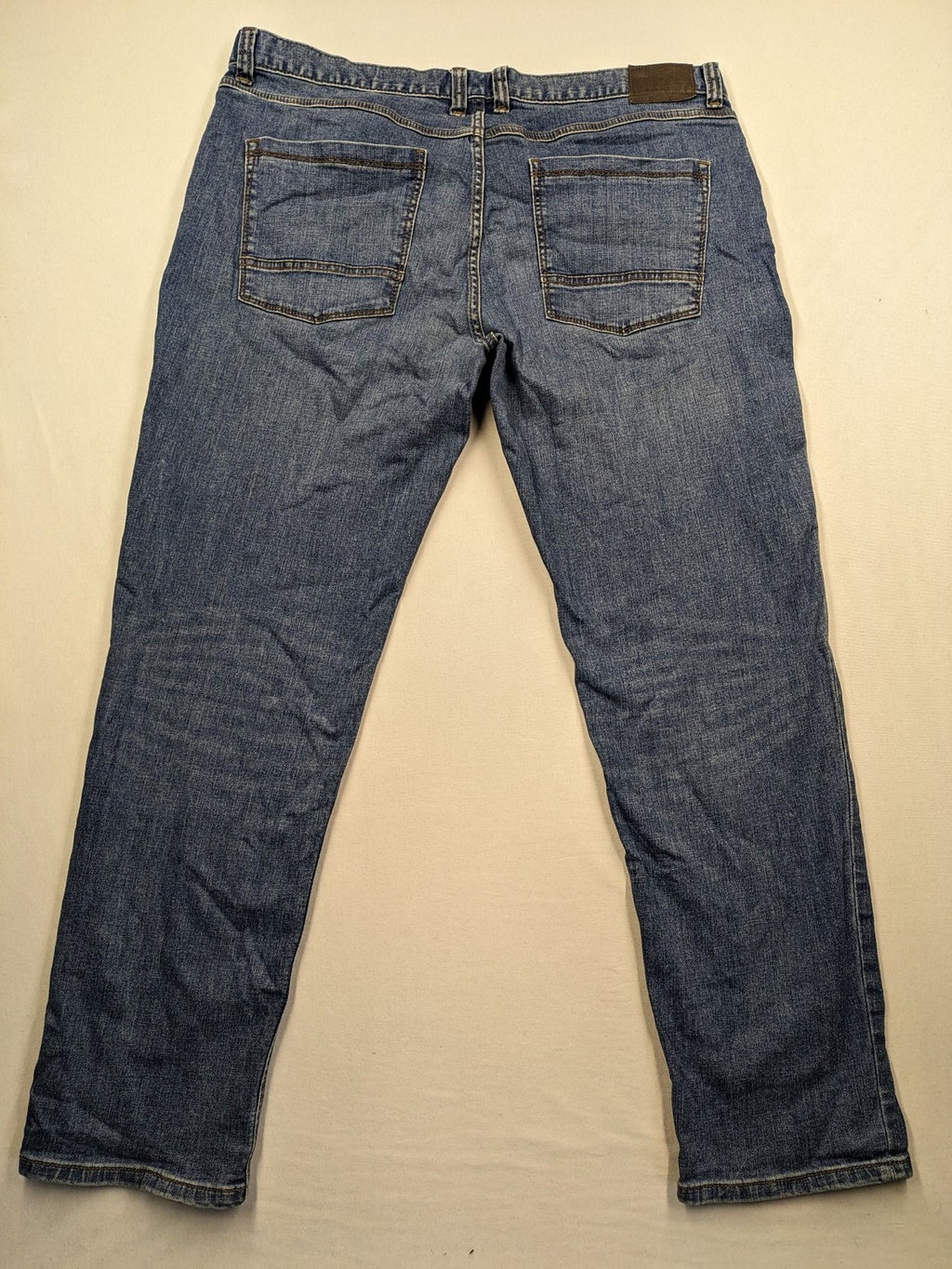 Montego blue straight jeans with stretch denim, classic design, and regular fit.