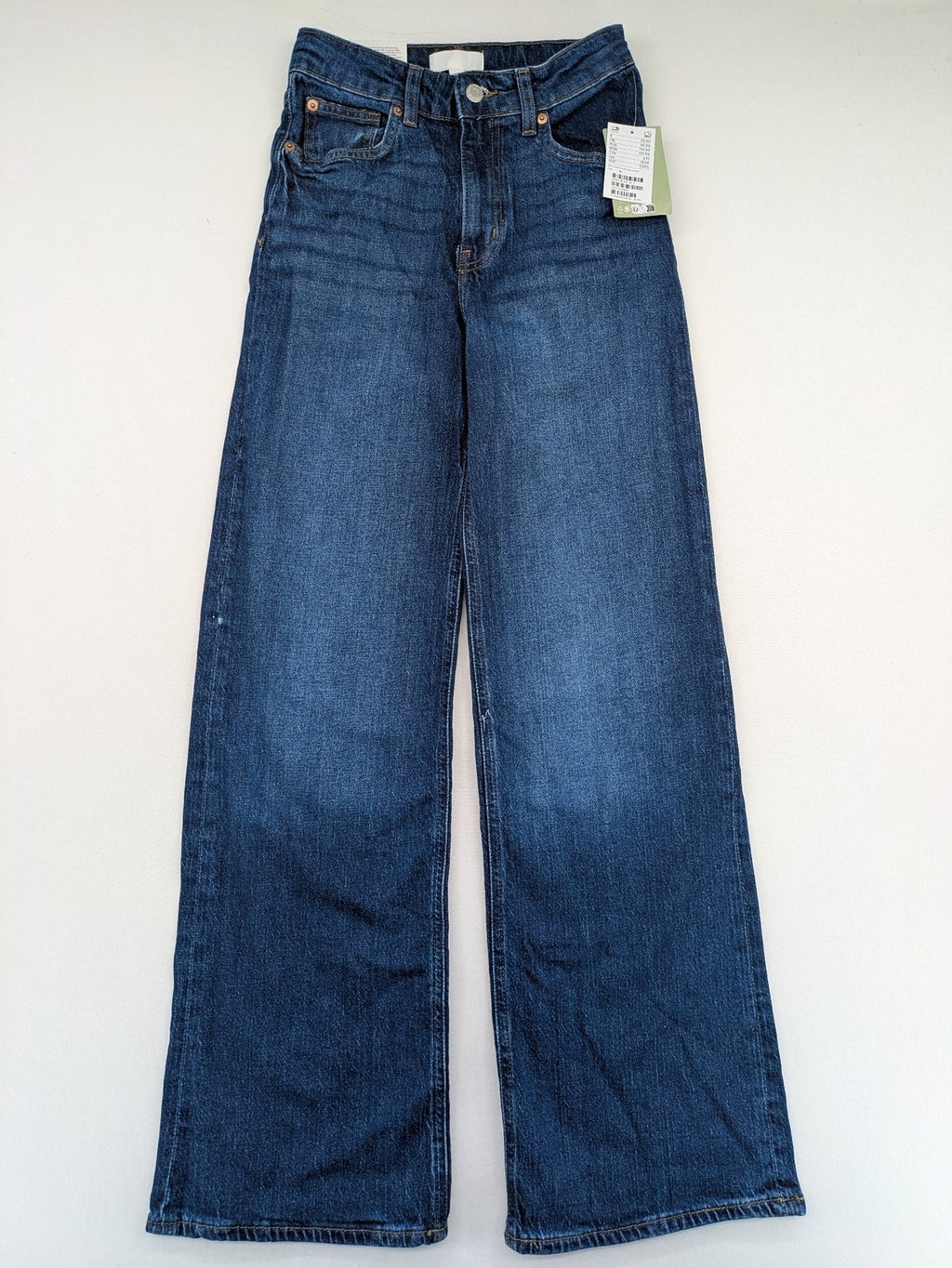 H&M blue wide leg high waist jeans with classic 5-pocket design and stretch denim.