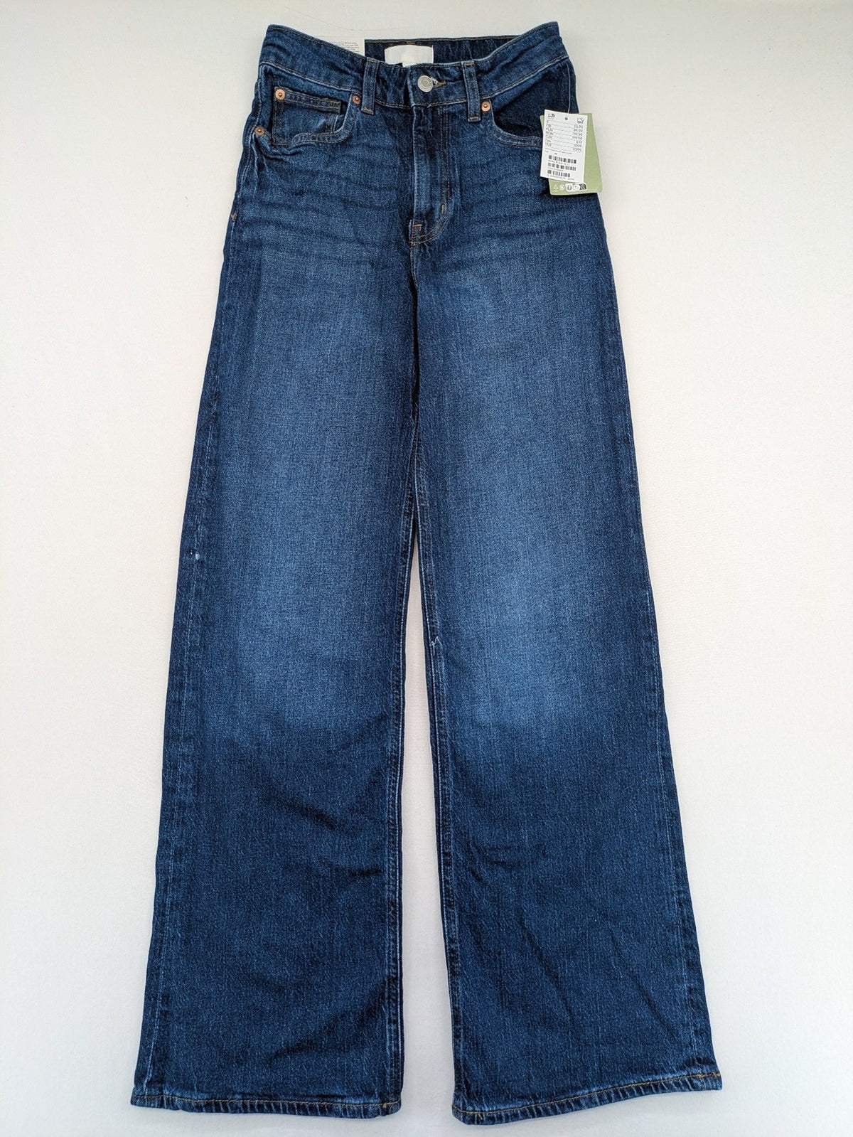 H&M blue wide leg high waist jeans with classic 5-pocket design and stretch denim.