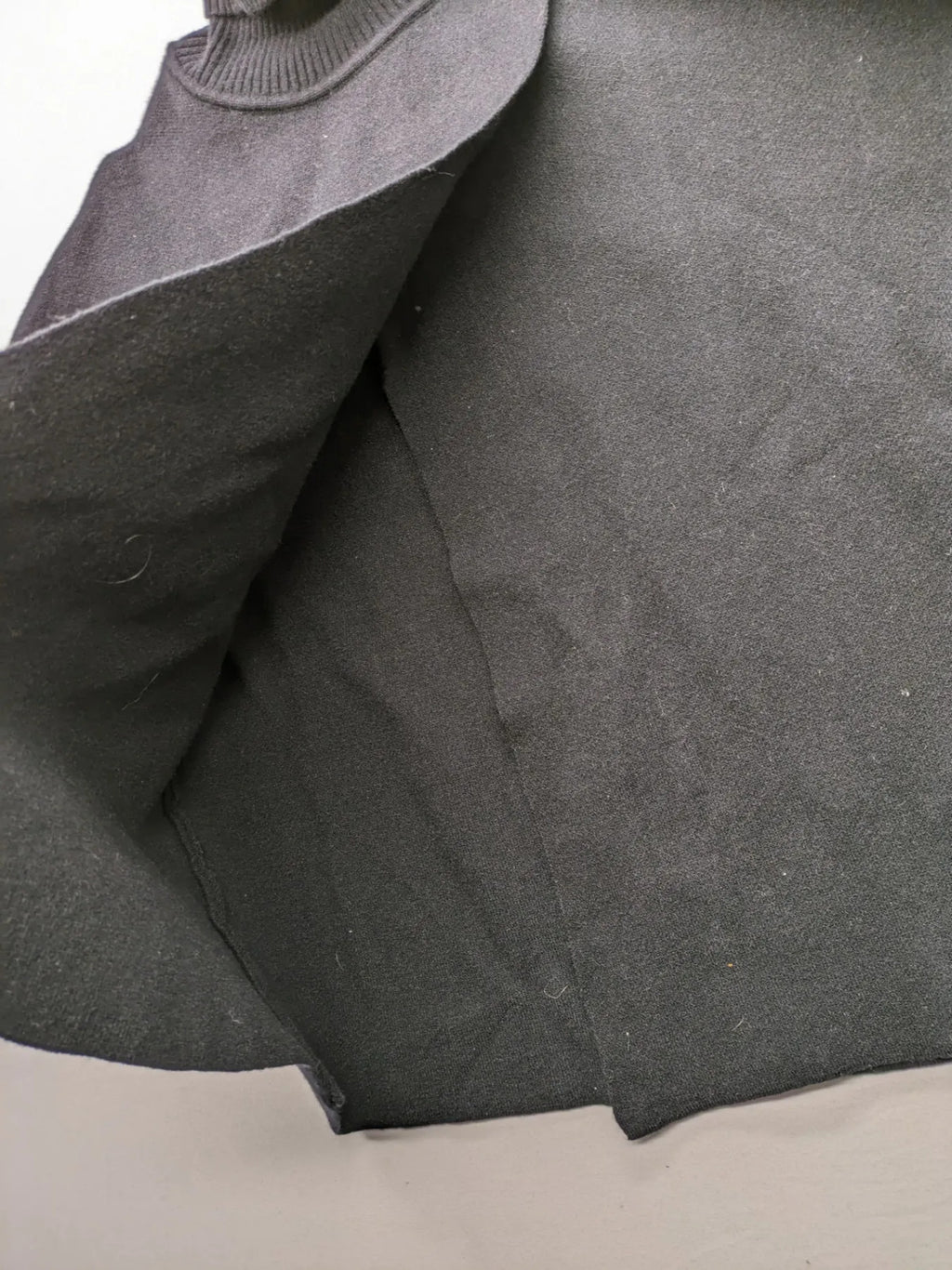 In Shape grey turtle neck jumper asymmetrical design, soft viscose blend material.