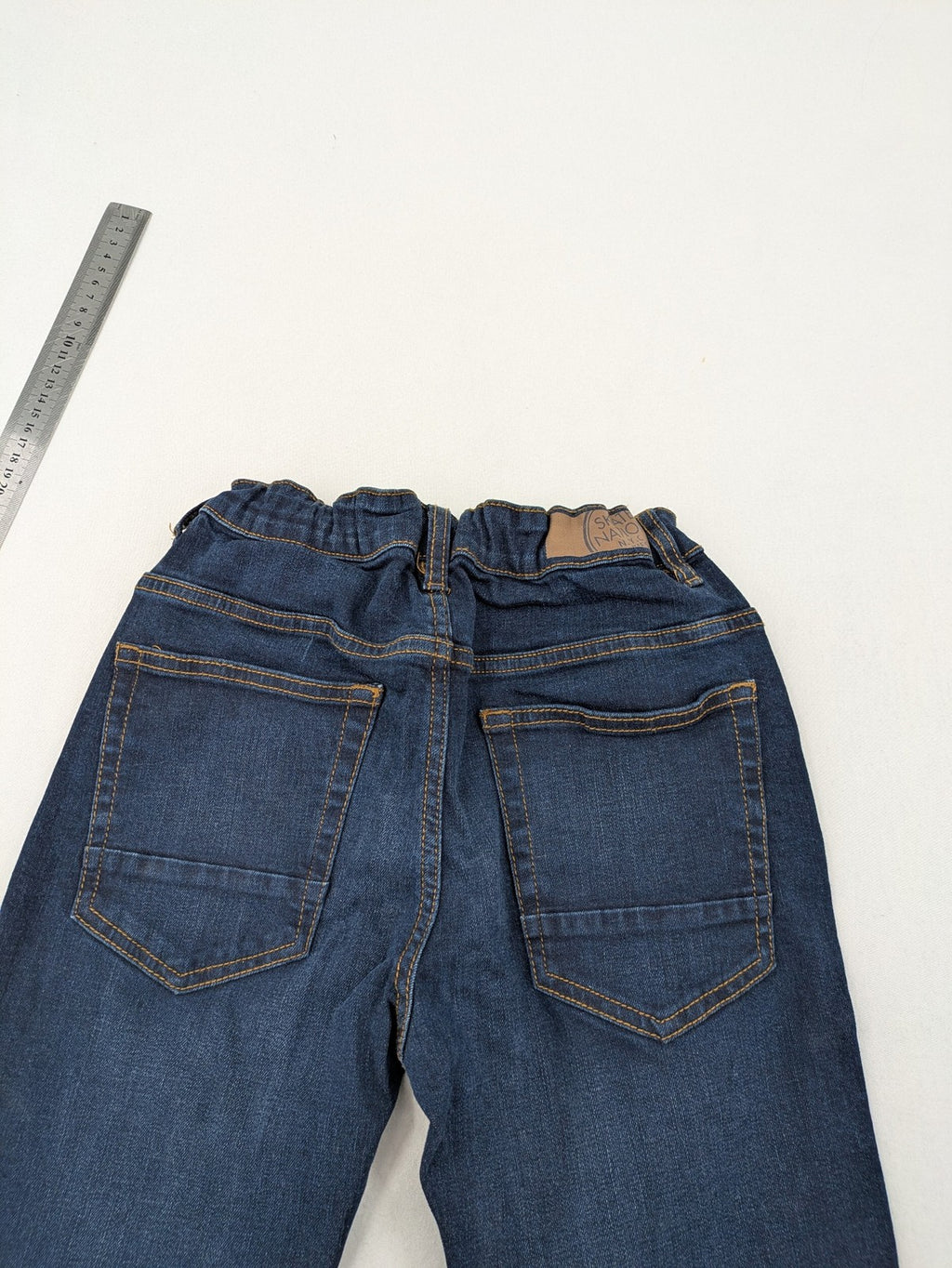 Skate Nation blue straight jeans 5-pocket design with adjustable waistband and dark wash.