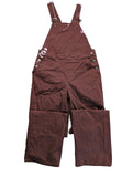 Kazane burgundy overalls with adjustable straps, side button placket, and chest pocket.