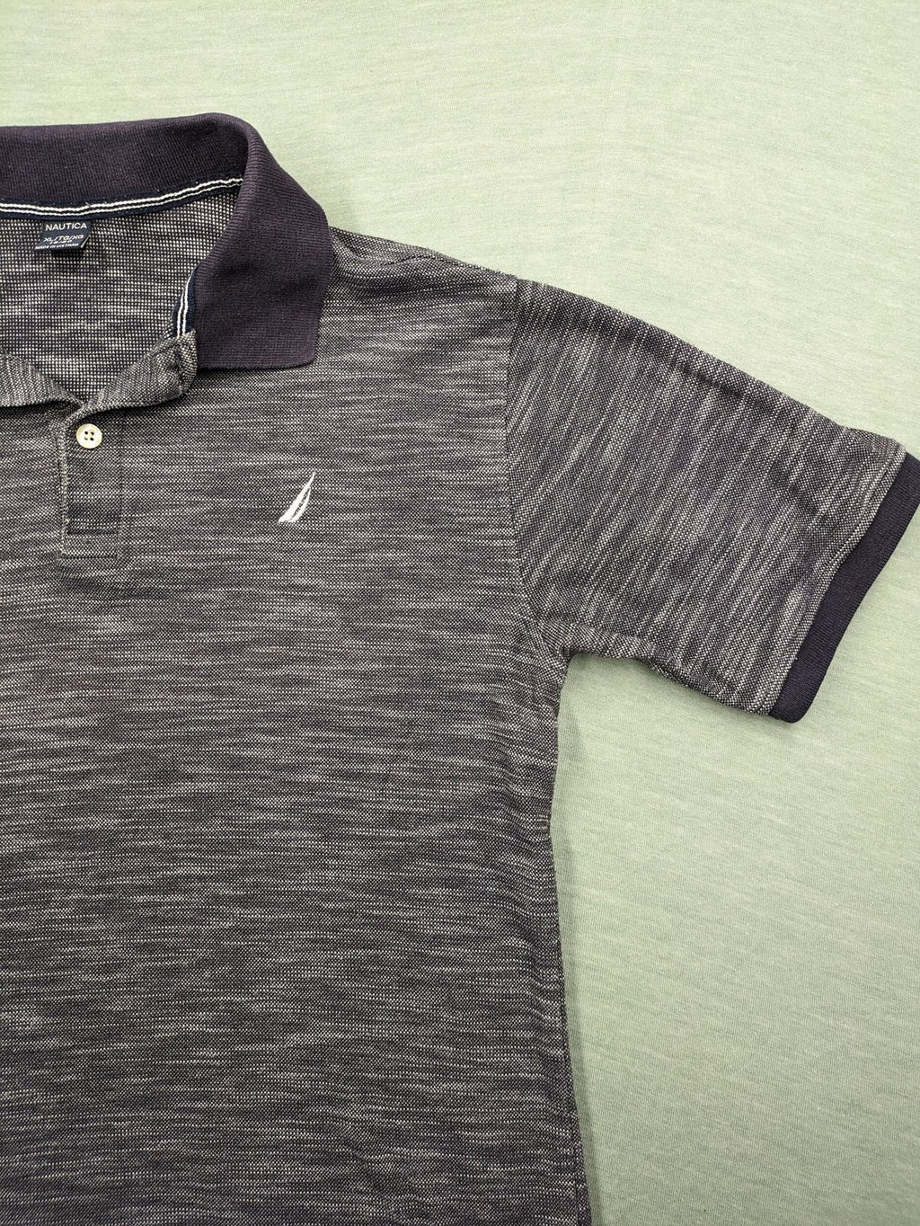 Nautica grey melange polo shirt with contrasting collar and embroidered sail logo.