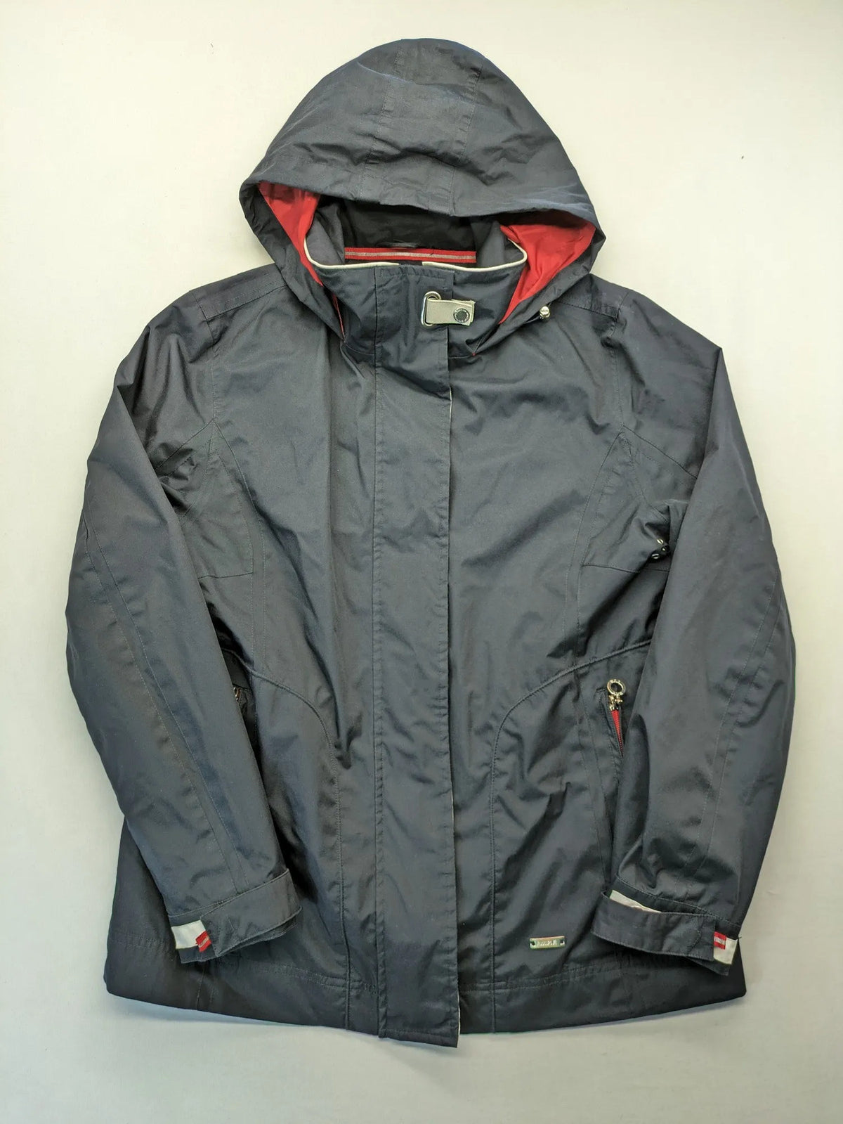 WPF grey outdoor jacket with red lining, zip closure, and hood.