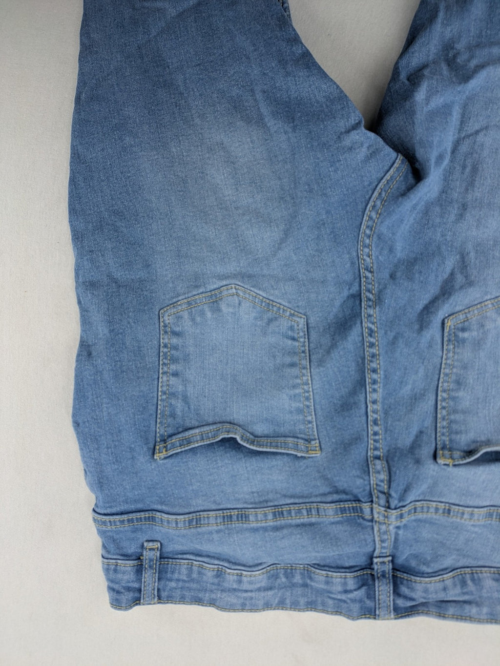 Janina blue skinny fit jeggings with elastic waistband and angled front pockets.