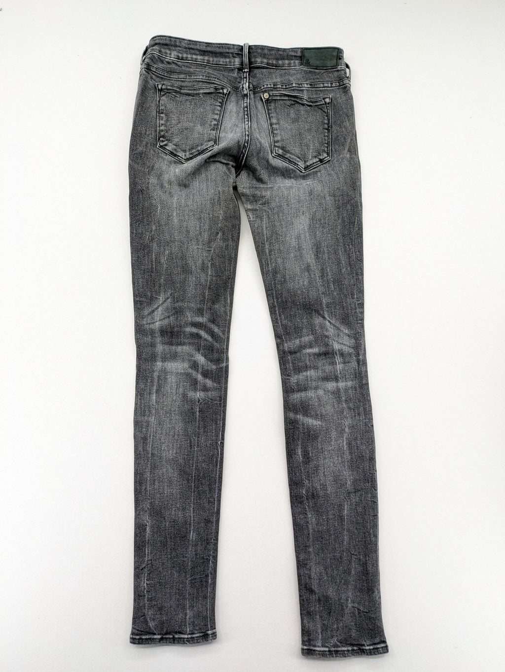 H&M grey skinny jeans with low rise, classic 5-pocket style, and washed denim finish.