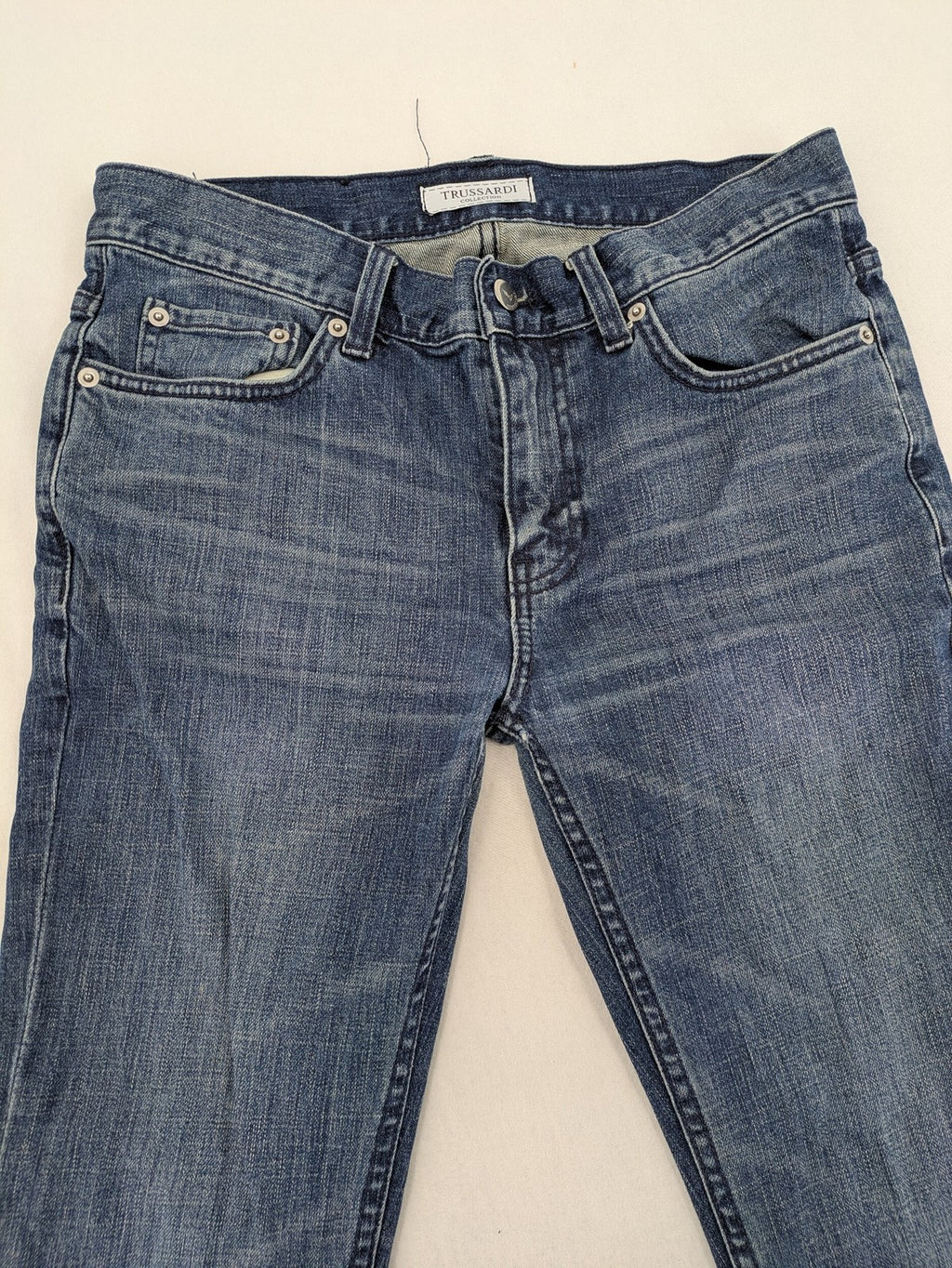 Trussardi blue straight jeans with classic 5-pocket design and durable denim material.