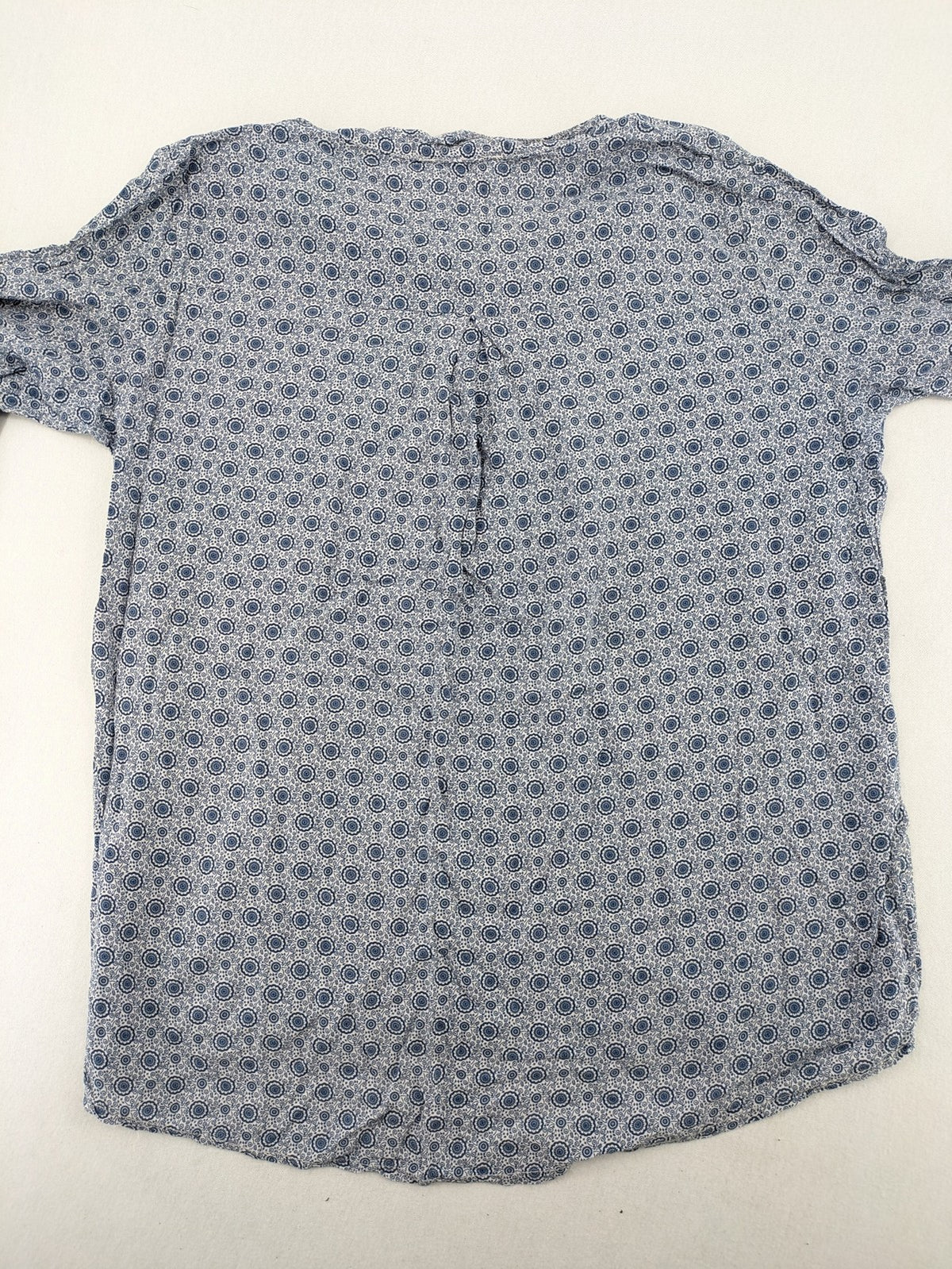 M/L blue and grey tunic top with geometric pattern and stand-up collar.