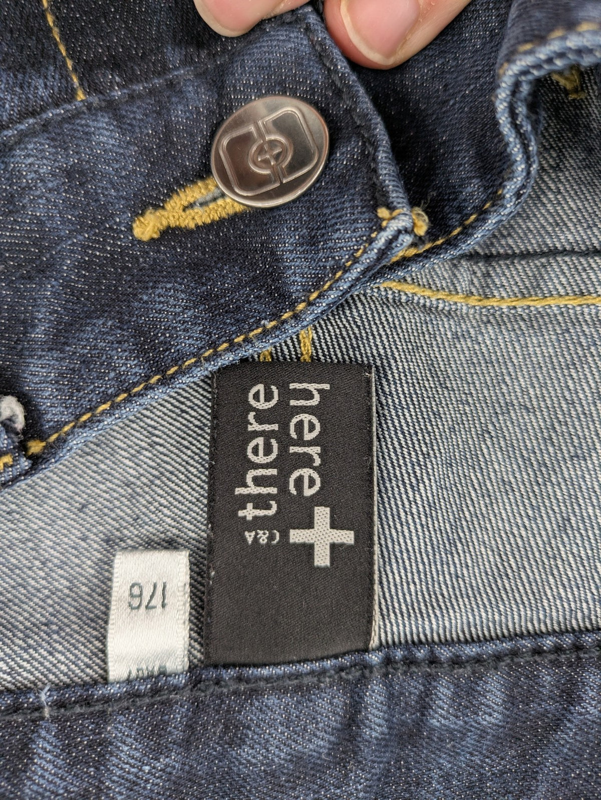 C&A blue straight leg jeans with classic 5-pocket design and faded wash details.