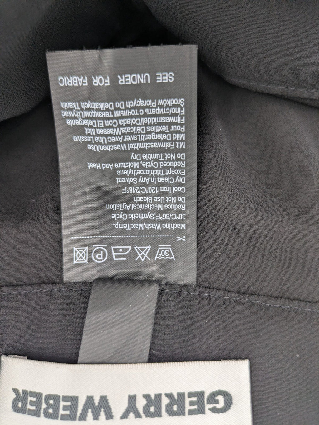 Gerry Weber grey palazzo pants with chiffon overlay and front slits.