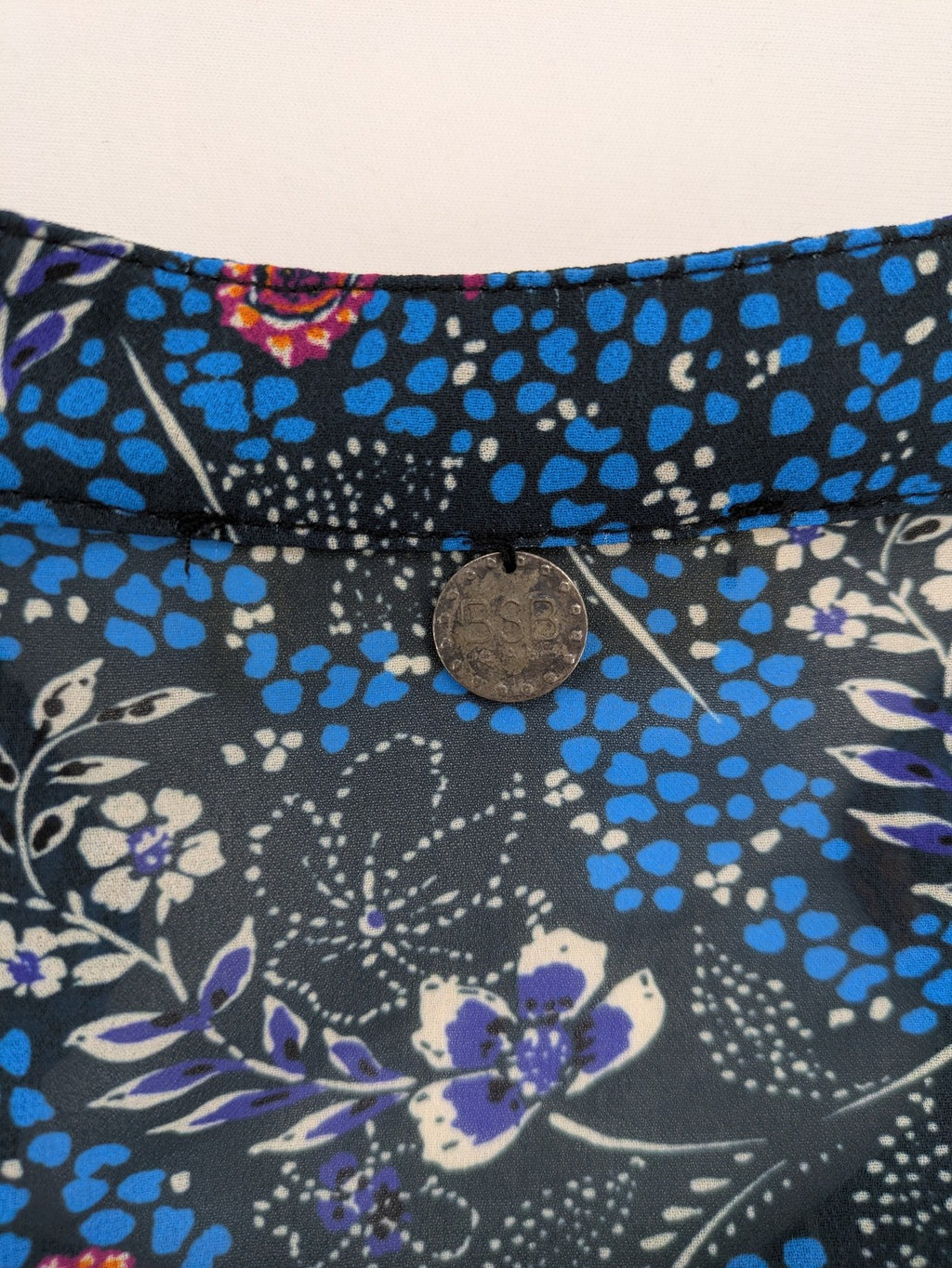 BSB multi-coloured bridal party dress with floral paisley pattern and ruffled hem.