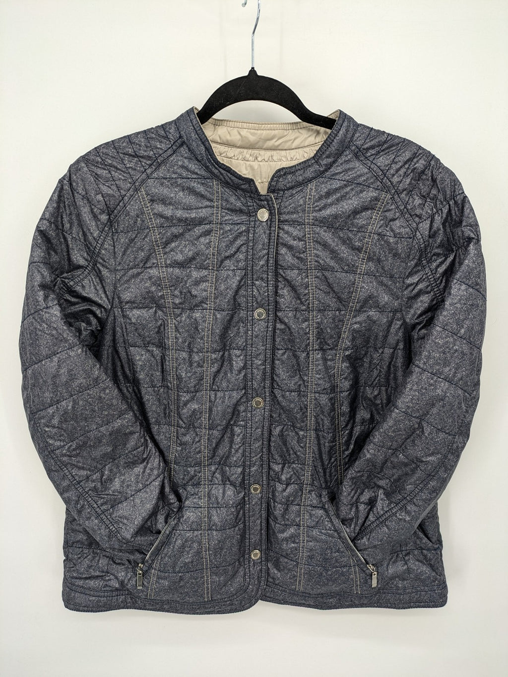 Bonita reversible jacket beige and blue, textured fabric, snap button closure.