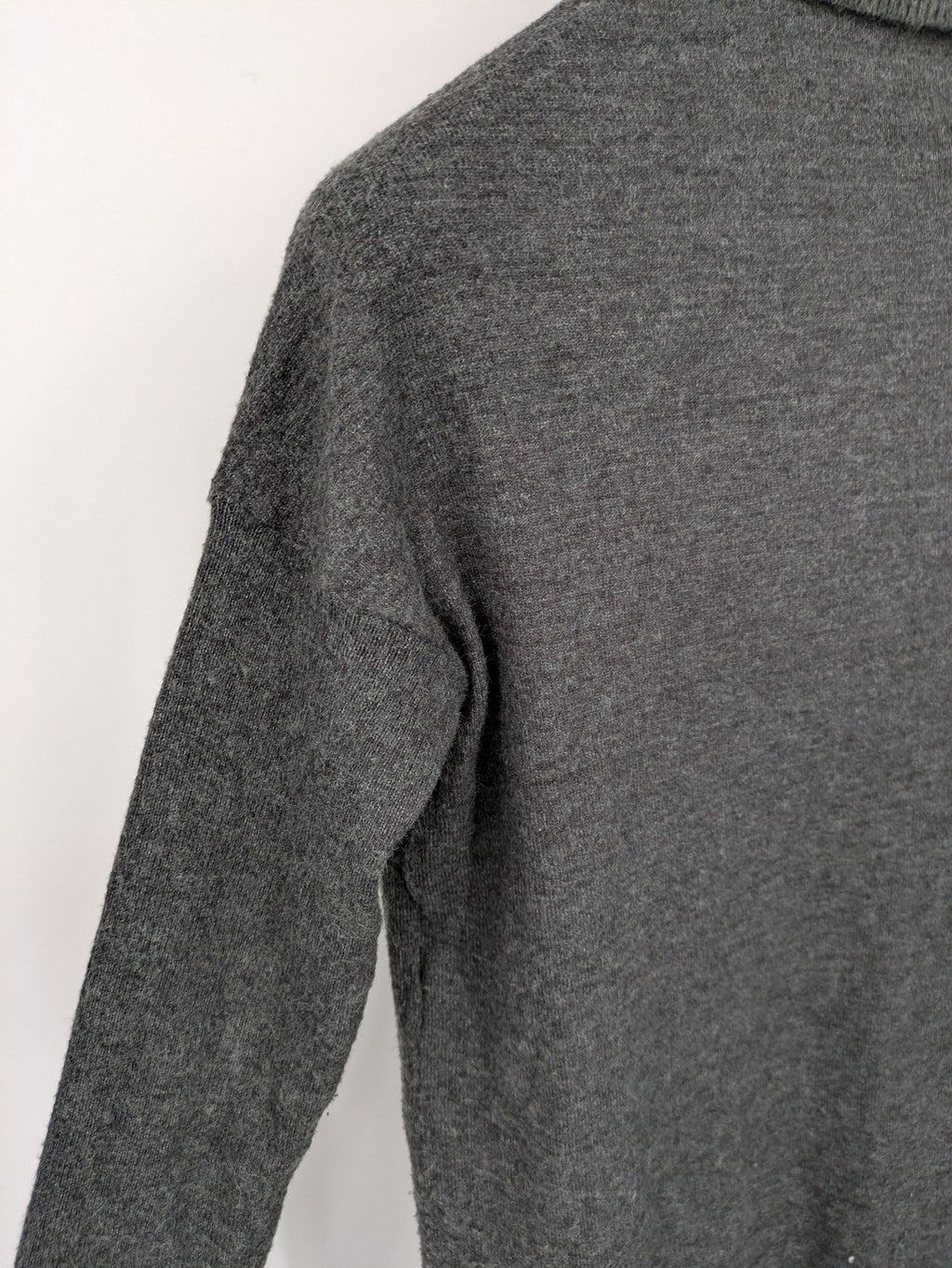 ONLY grey knitted midi dress with roll neck, long sleeves, and side slits.