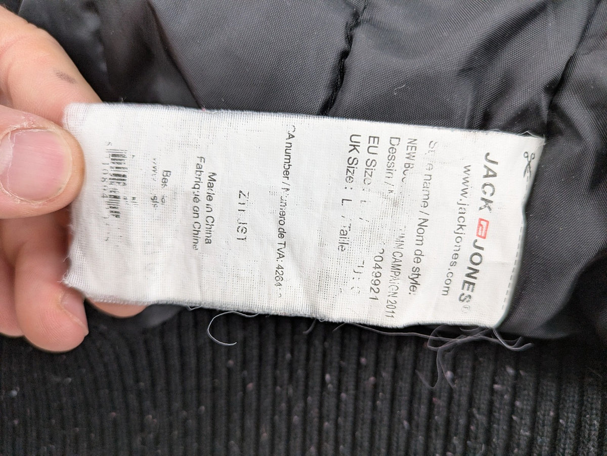 Jack & Jones grey checkered winter jacket with hood, quilted lining, and zip closure.