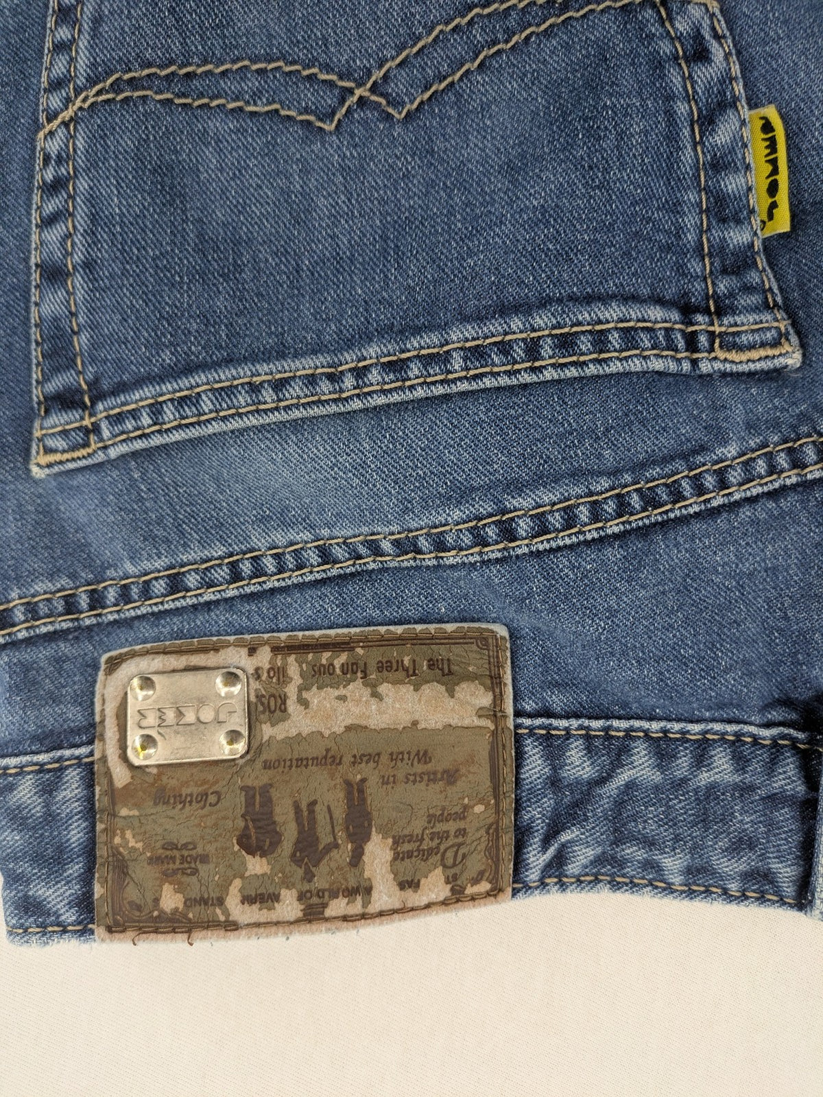 Joker blue straight leg jeans with double saddle stitched detail and classic denim wash.