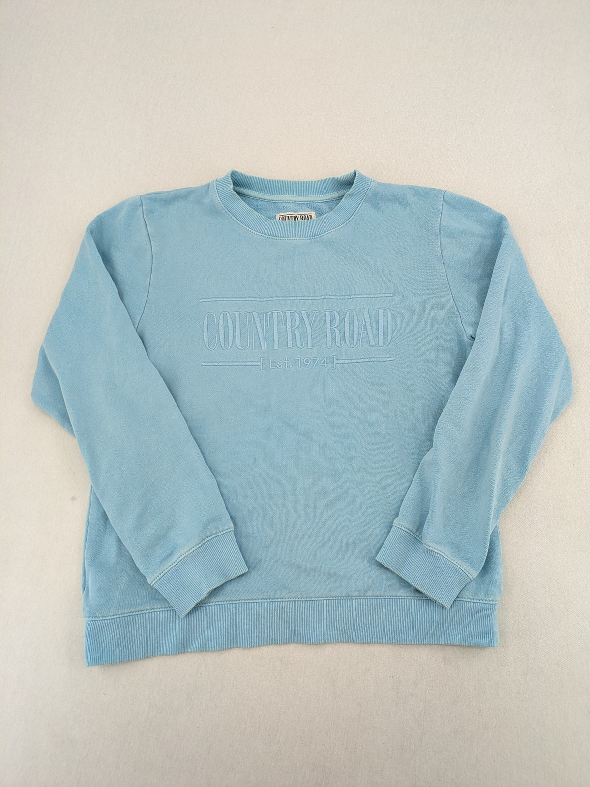 Country Road blue turtle neck jumper with embossed logo on chest, made from cotton.