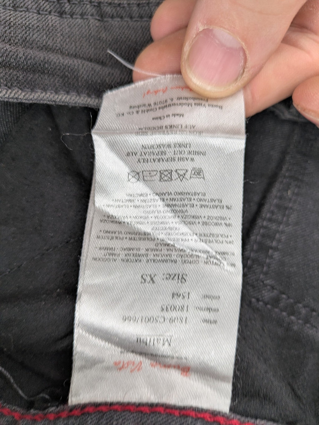 Buena Vista grey skinny jeans with button fly and stretch denim material.