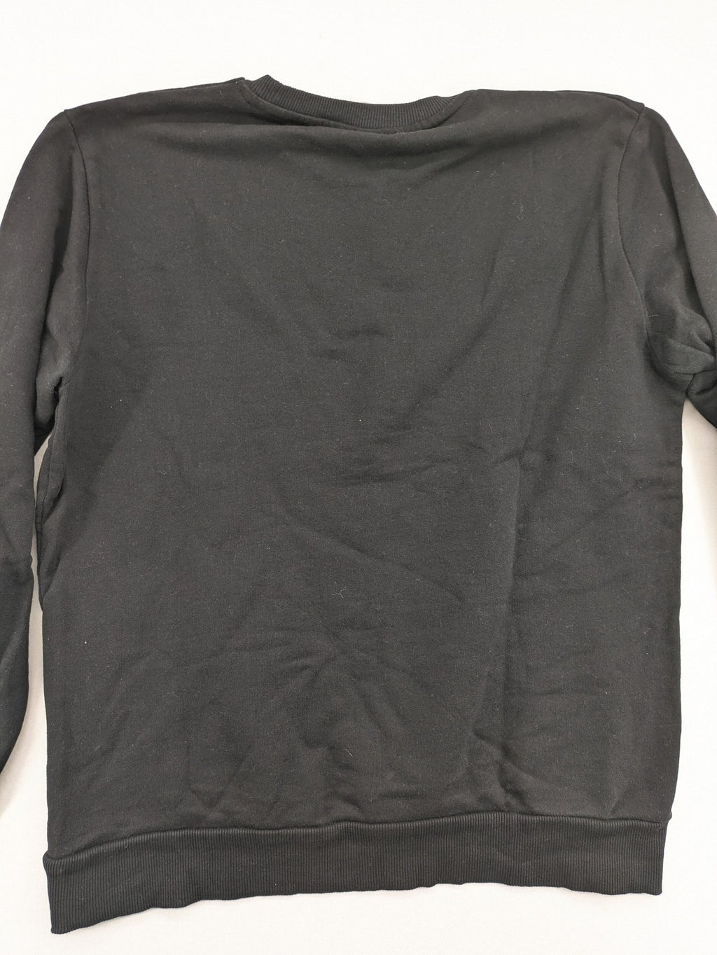 Zara grey turtle neck jumper with skull, scorpion, flame, and eagle embellishments.