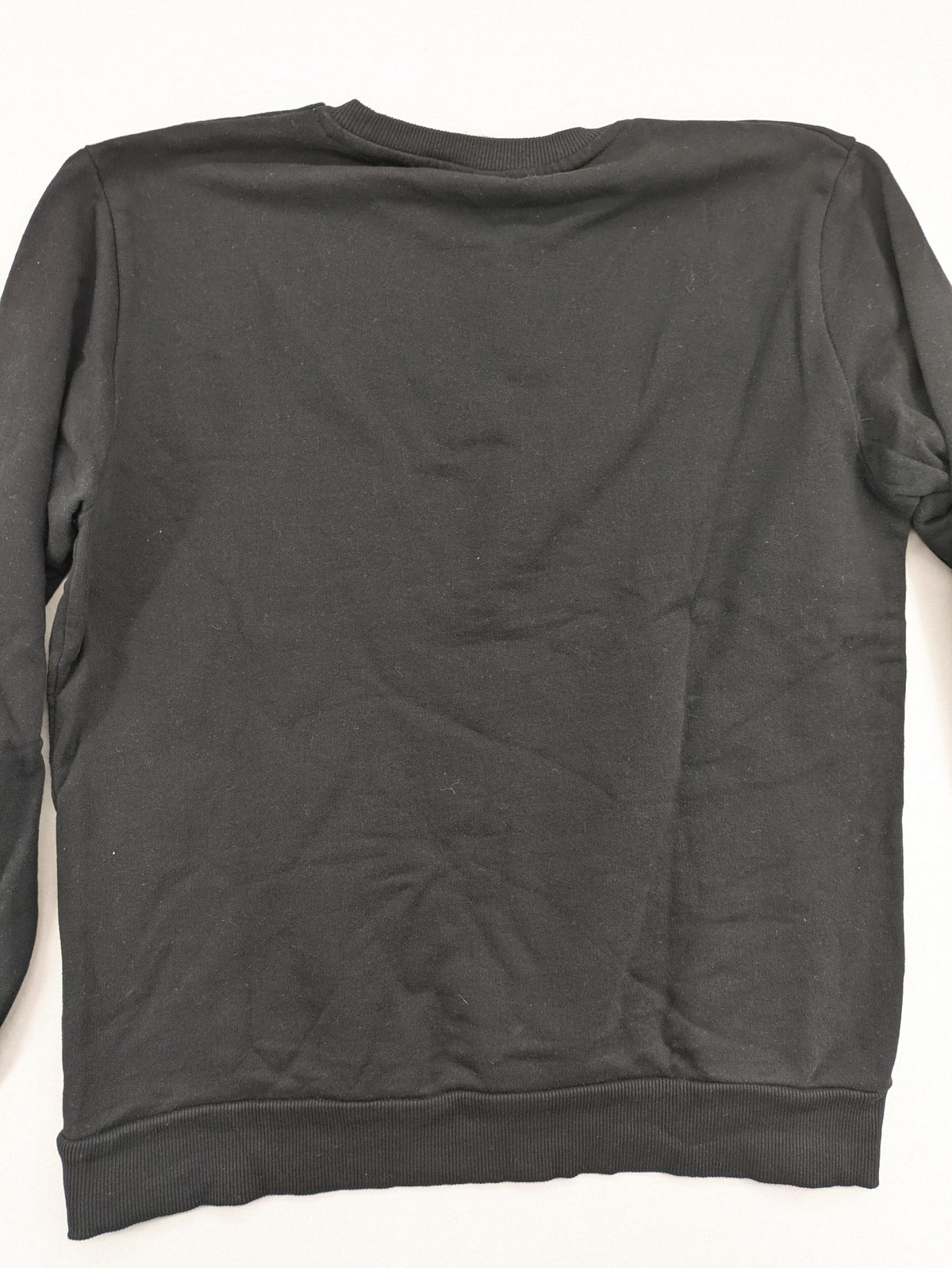 Zara grey turtle neck jumper with skull, scorpion, flame, and eagle embellishments.