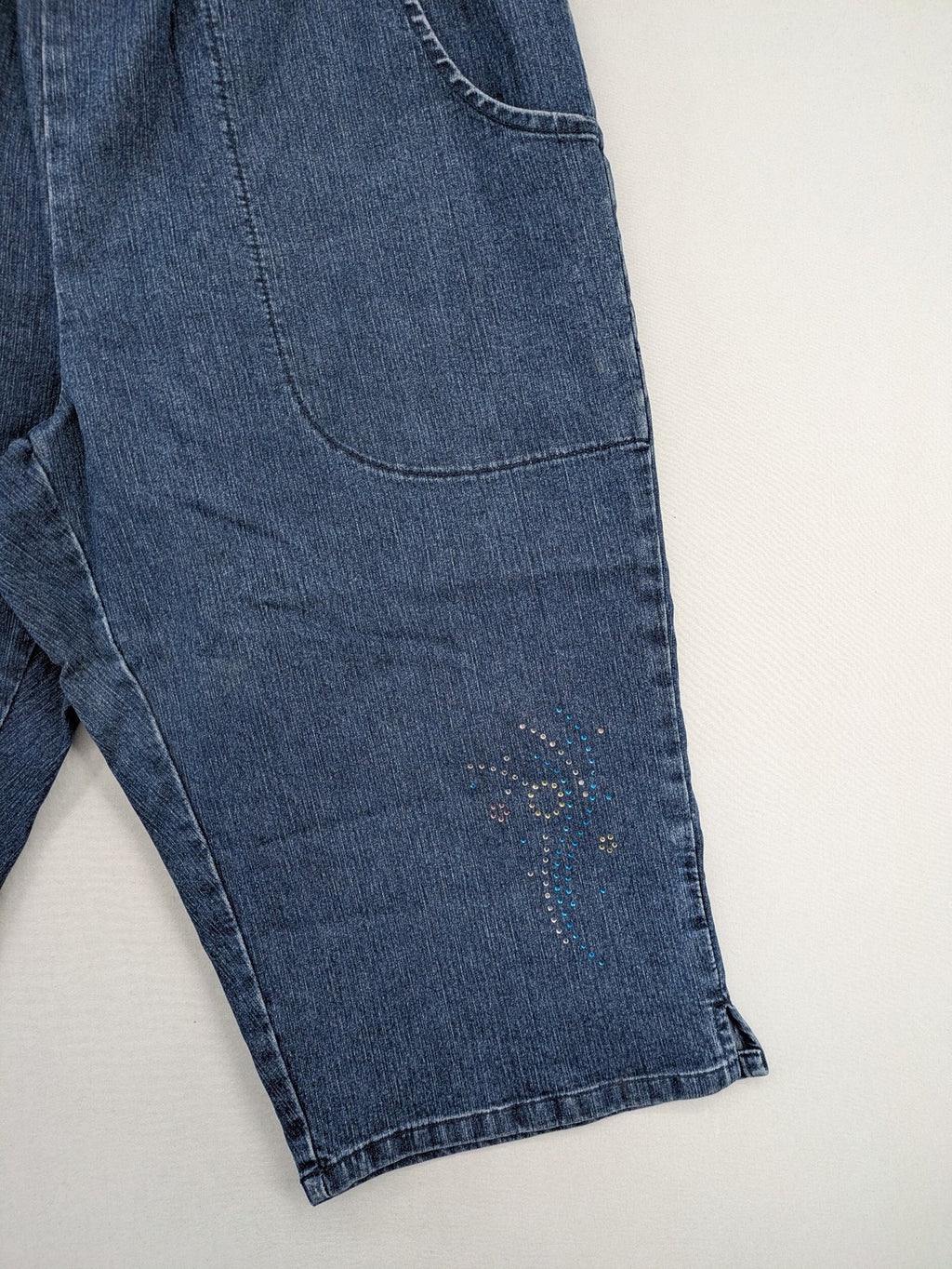 Denim & Co. blue capri jeans with elastic waistband and embellished rhinestones.
