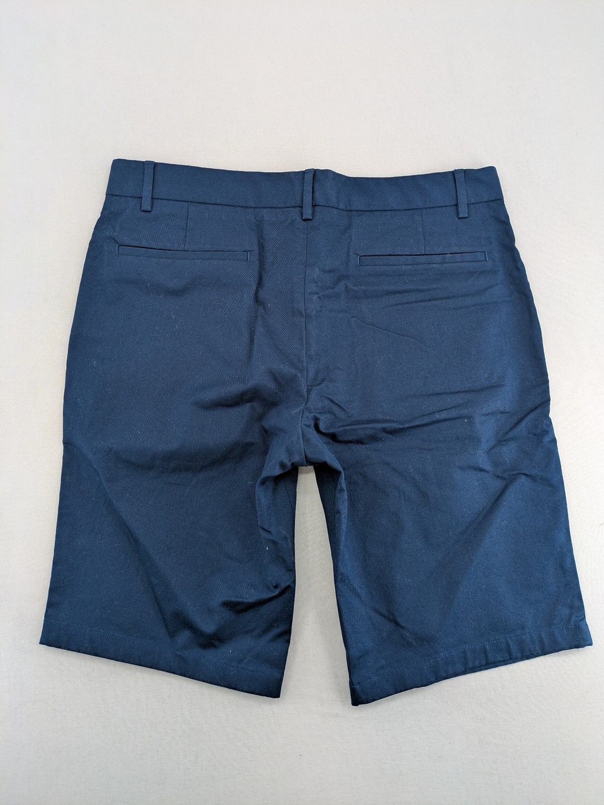 Spoke navy chino shorts flat front with unique printed pocket lining.