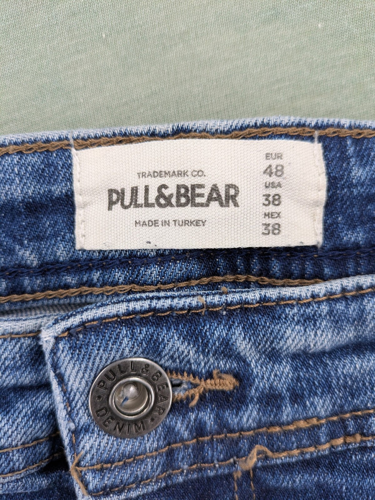 Pull&Bear blue straight jeans with distressed details and classic 5-pocket design.