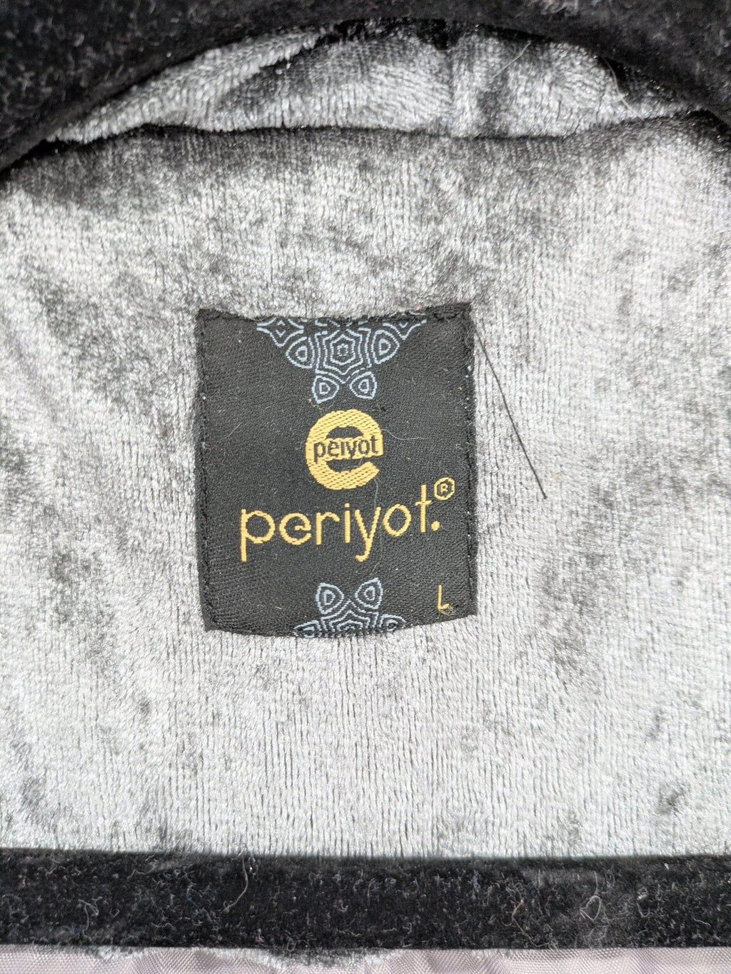 Periot grey puffer jacket with high collar and O-ring zipper detail in velvet texture.
