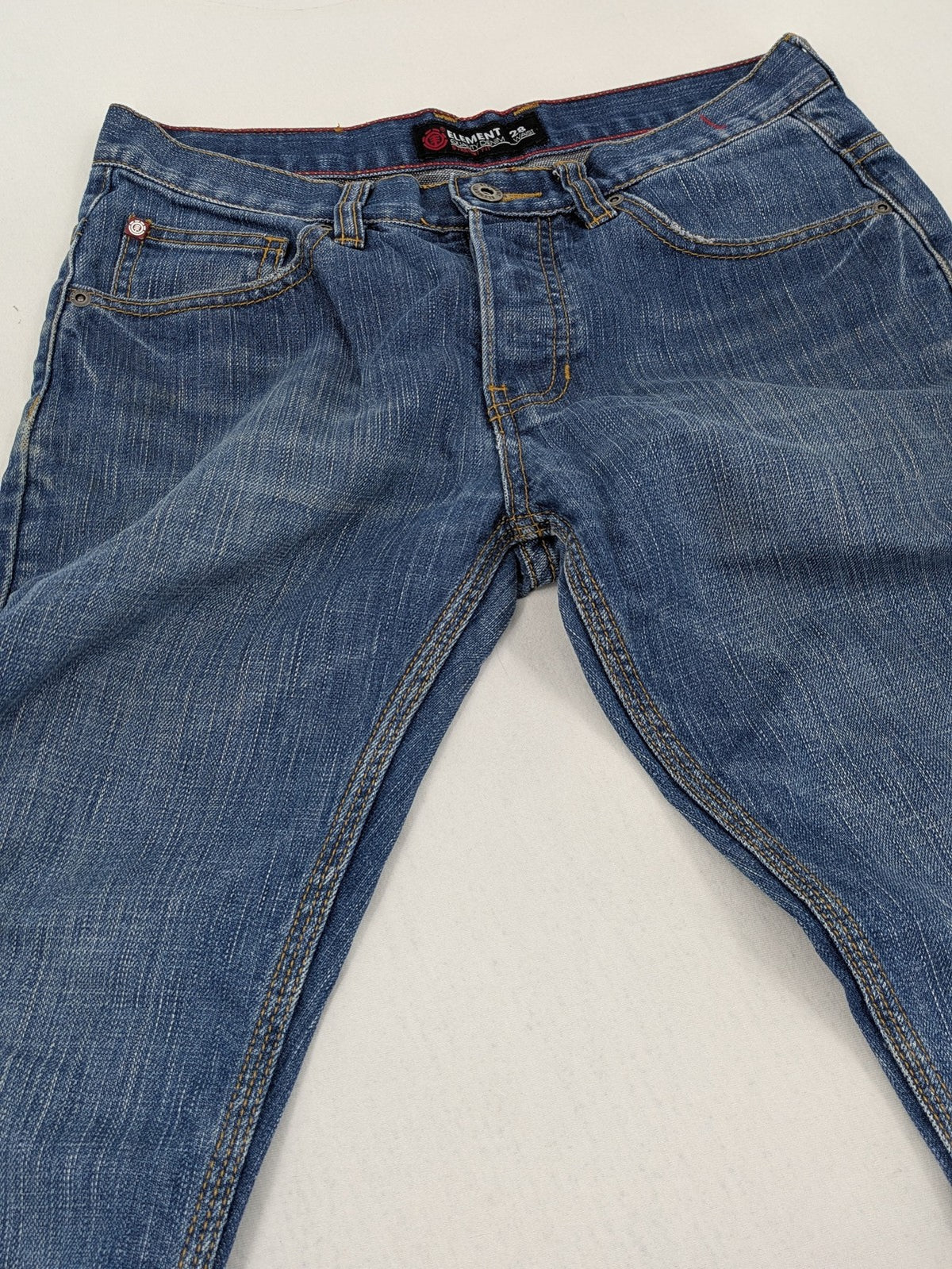Element blue straight jeans with classic button fly and 5-pocket design.