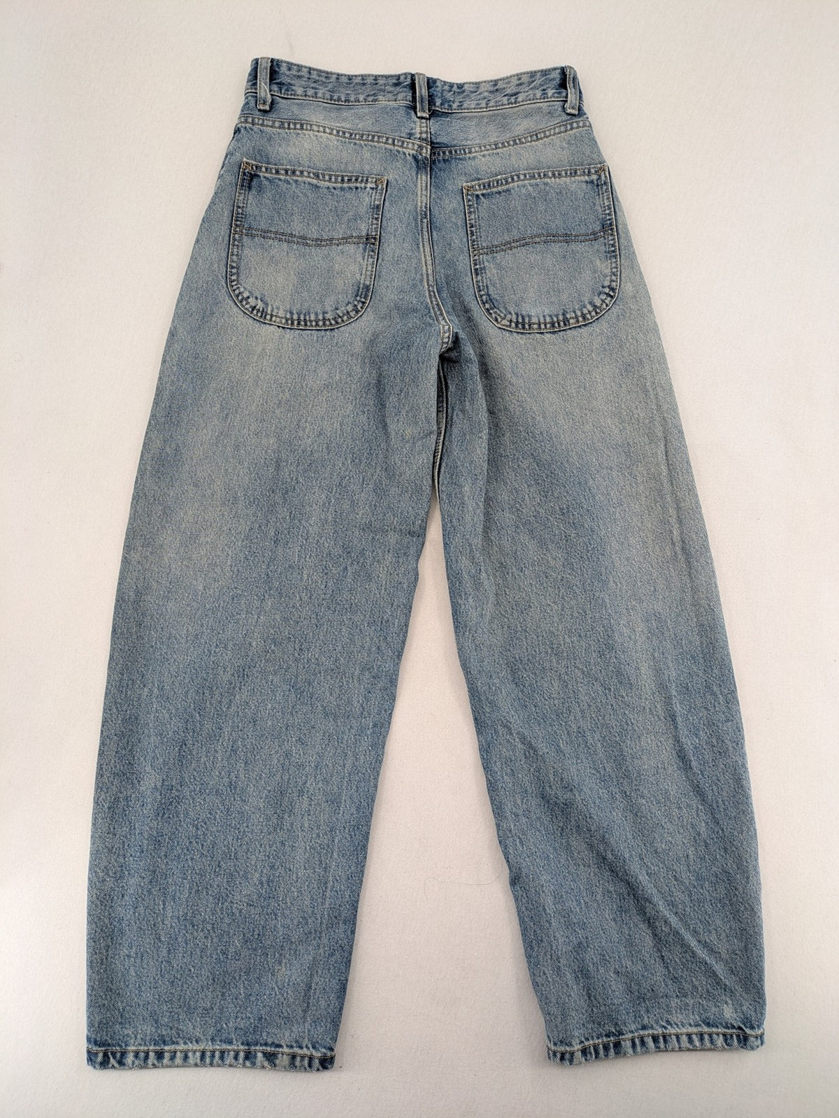 Bershka blue wide leg jeans high waist baggy style with light wash and cotton material.