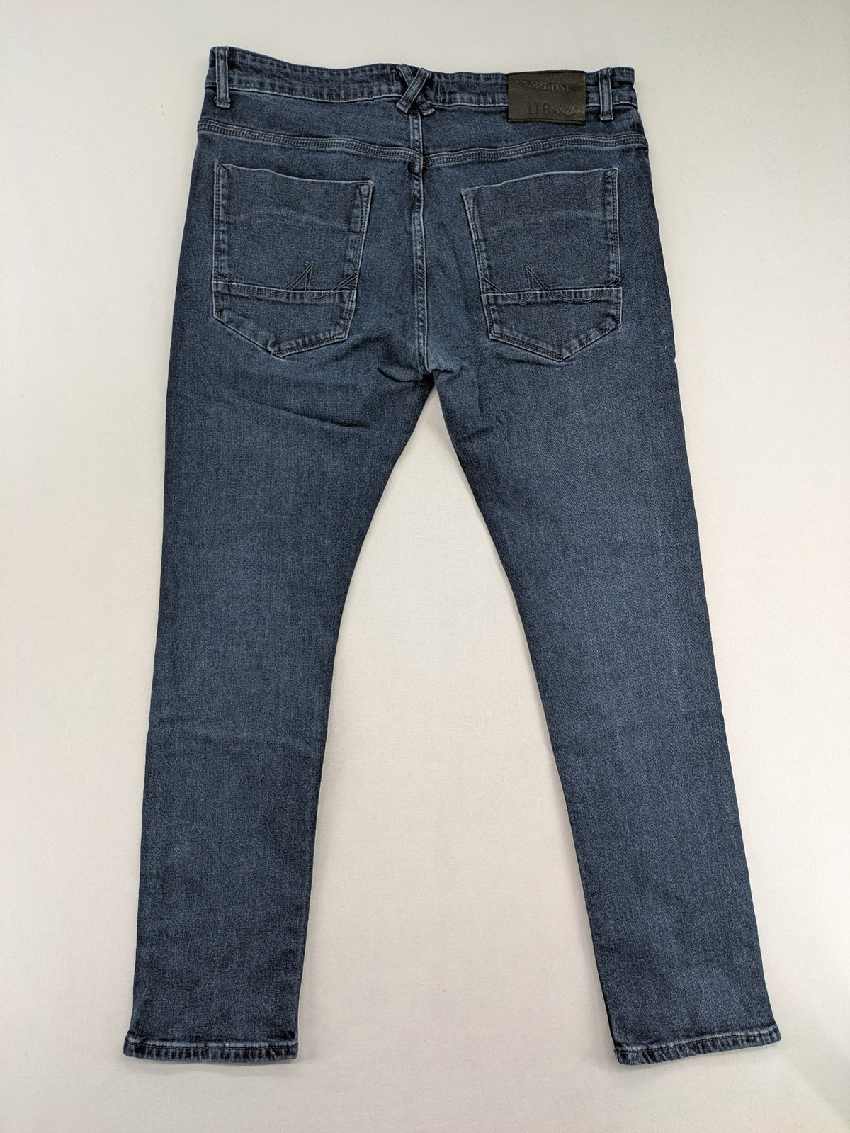 LTB blue straight jeans Joshua model with low rise slim fit and stretch denim.