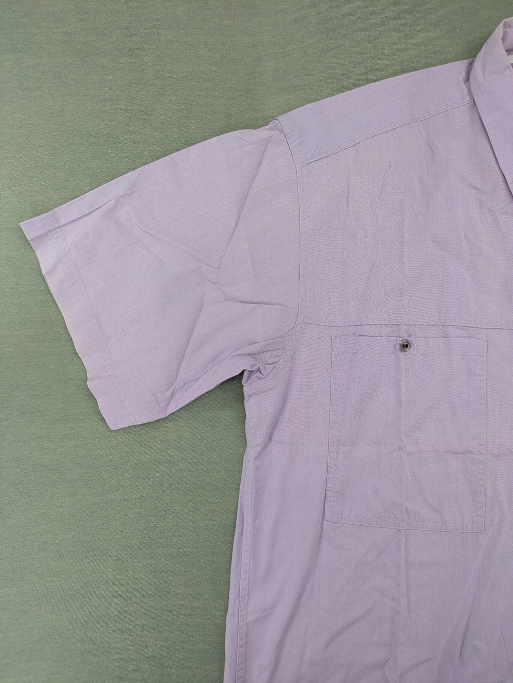 Mingo purple short-sleeve button-down shirt with classic collar and chest pockets.