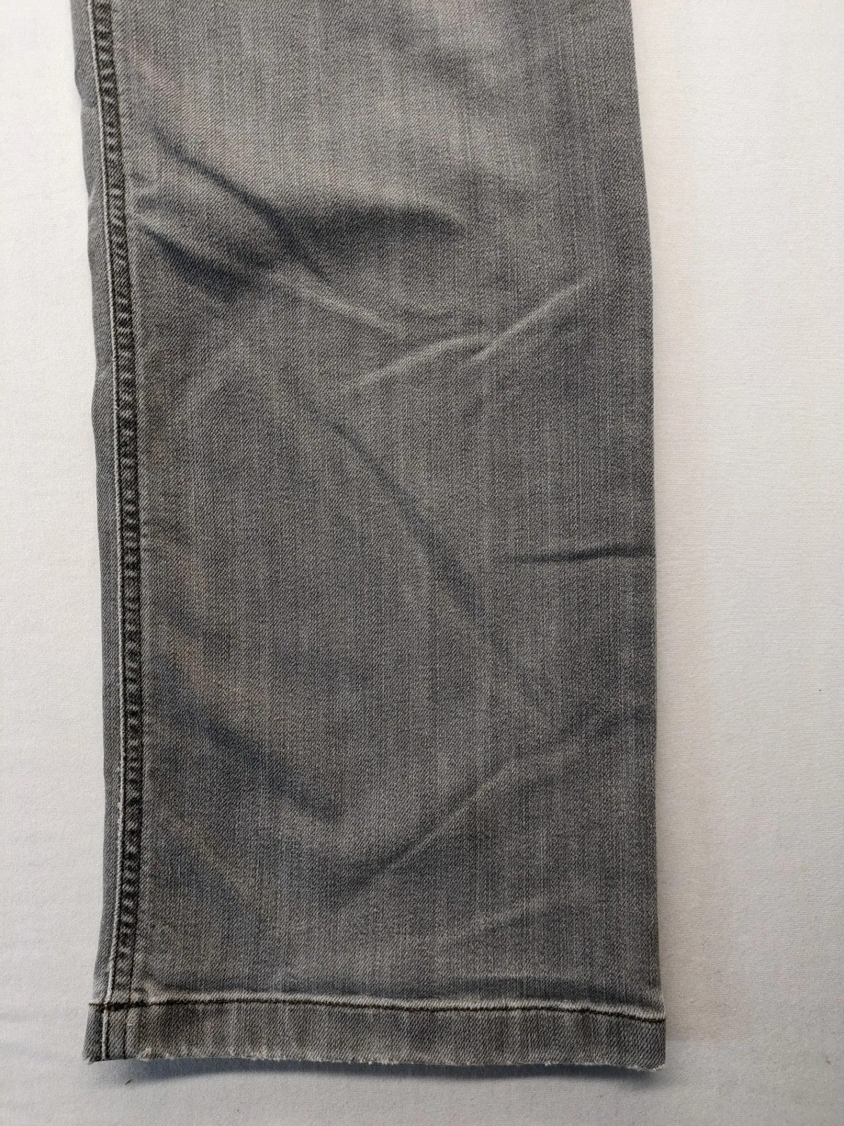 BRAX grey straight jeans with classic 5-pocket style and washed denim finish.