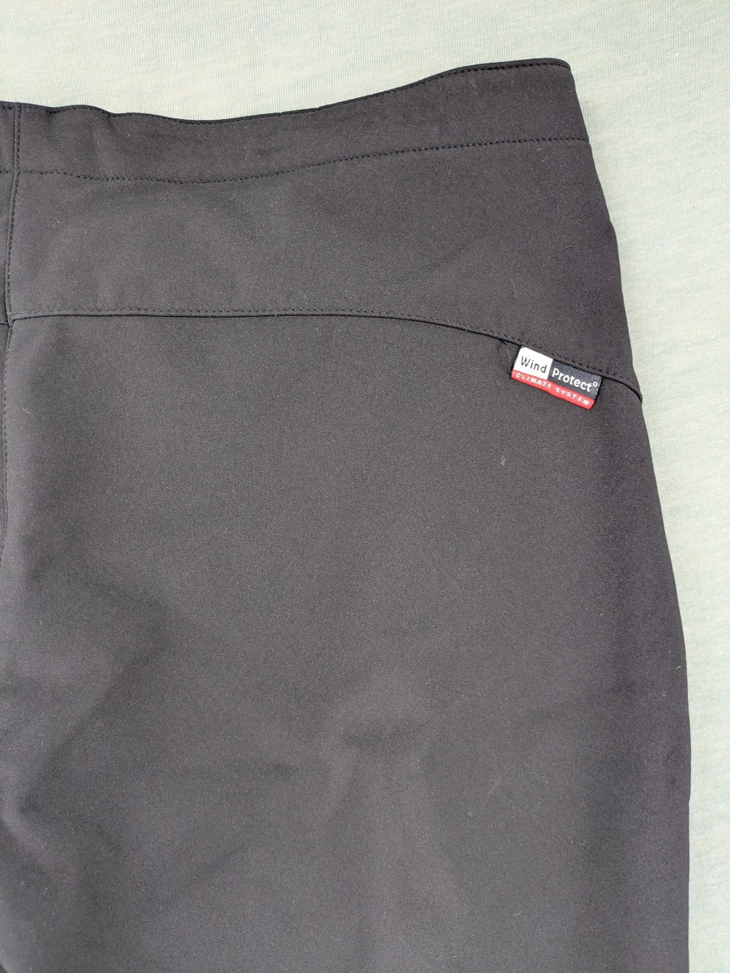 cmp black softshell pants with wind protection technology and white logo details