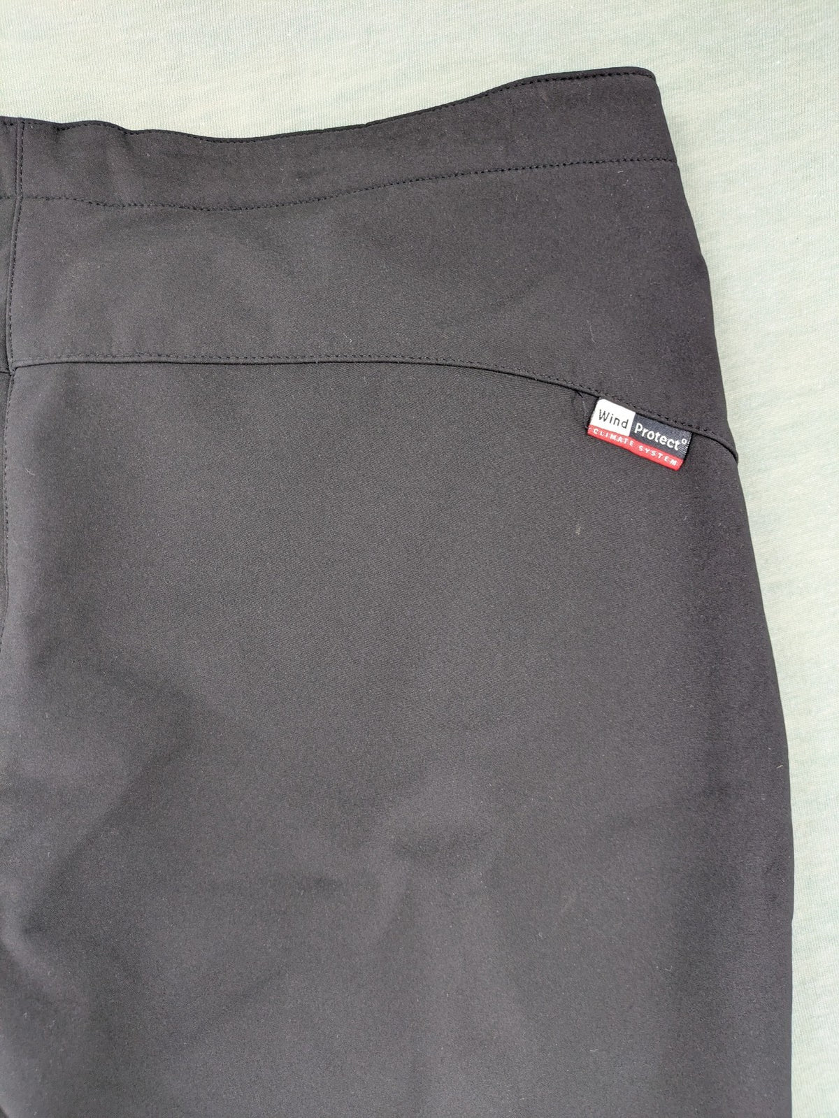 cmp black softshell pants with wind protection technology and white logo details
