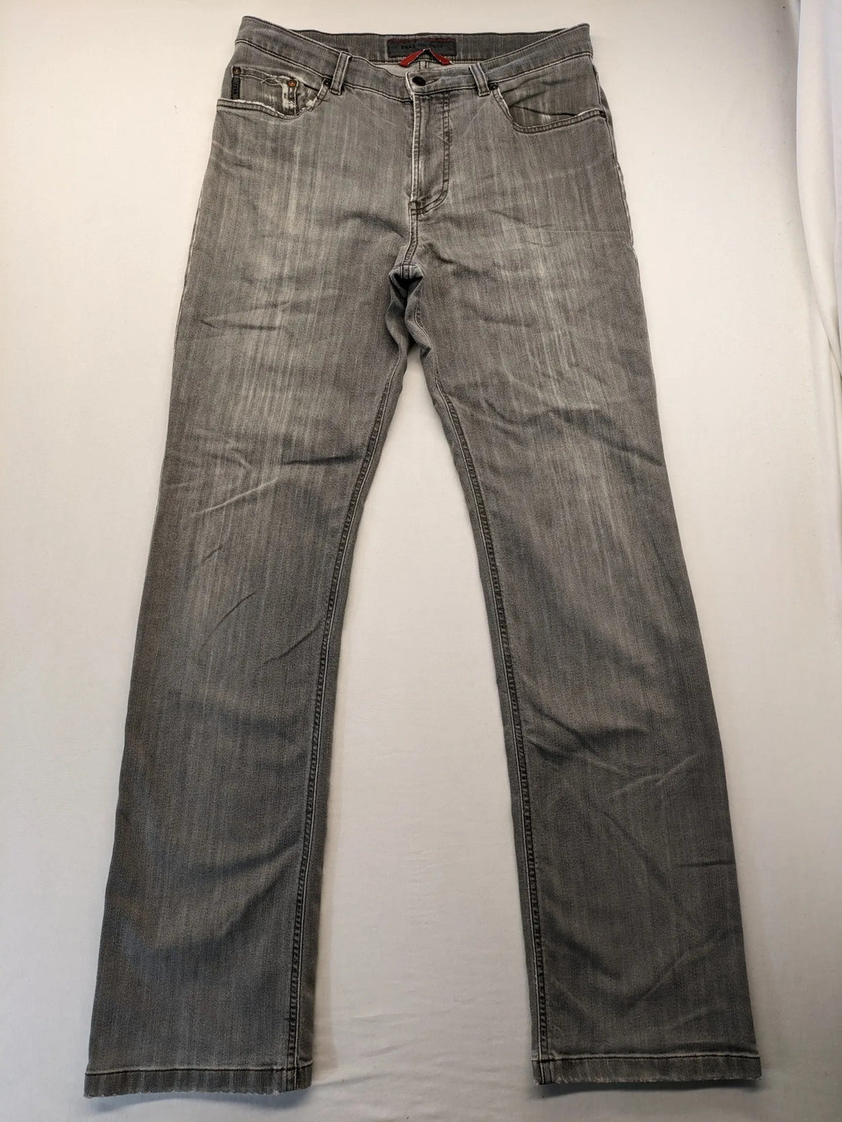 BRAX grey straight jeans with classic 5-pocket style and washed denim finish.