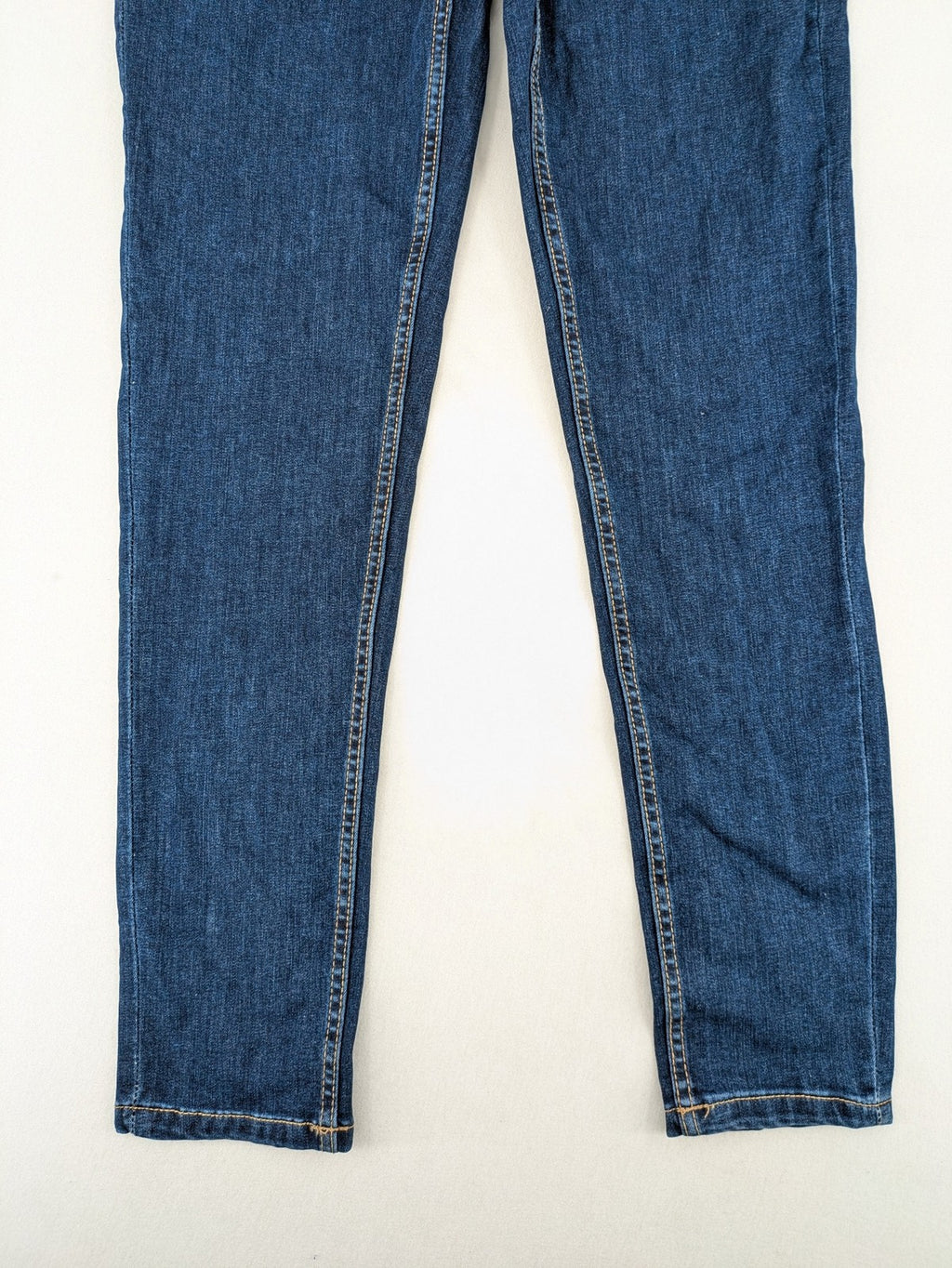 ESMARA blue super skinny jeans with dark wash and stretch denim material.