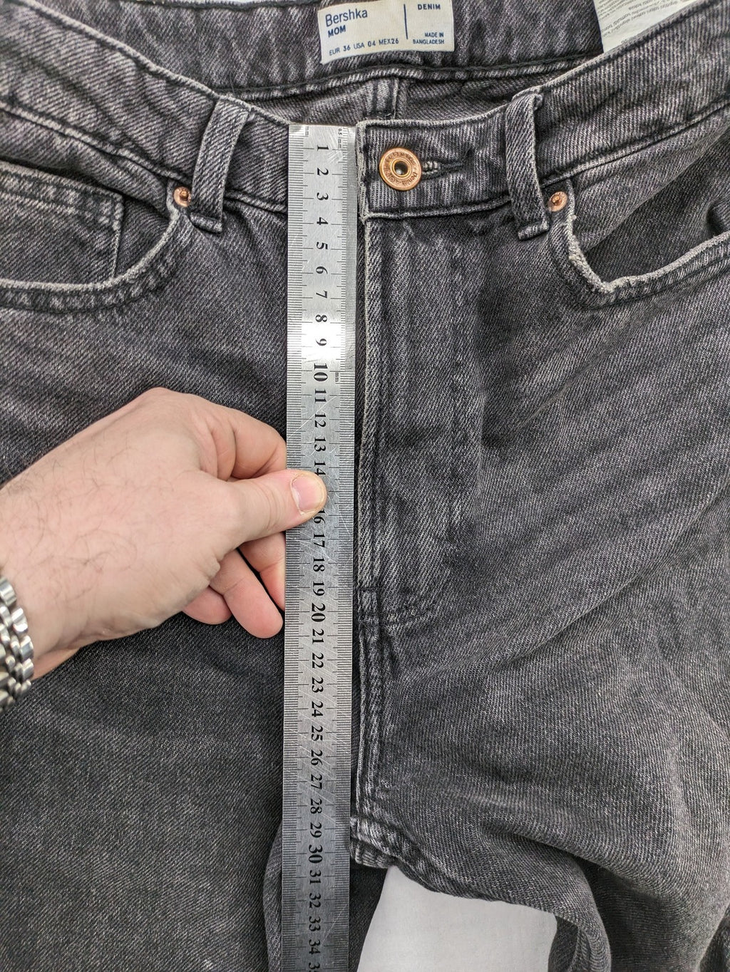 Bershka black mom jeans high-waist straight leg washed denim with classic five-pocket design.