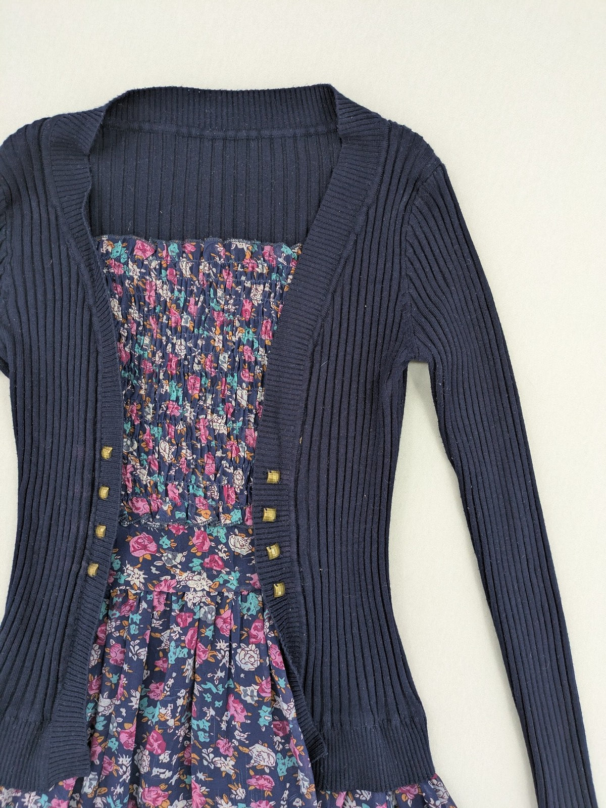 Damen turtle neck jumper dark blue floral ribbed knit with delicate lace hem.