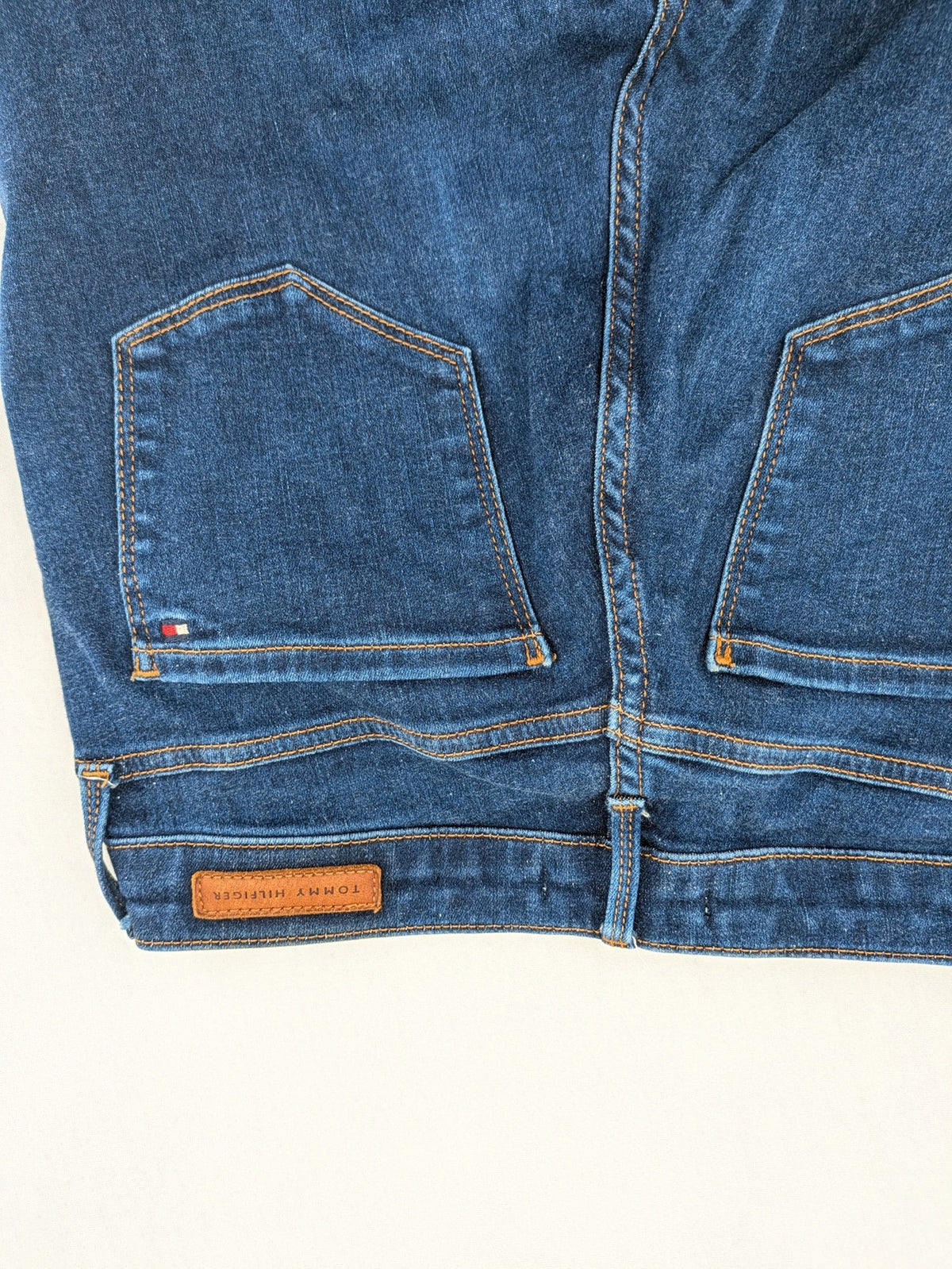 Tommy Hilfiger blue skinny jeans, five-pocket design, made from organic cotton blend.