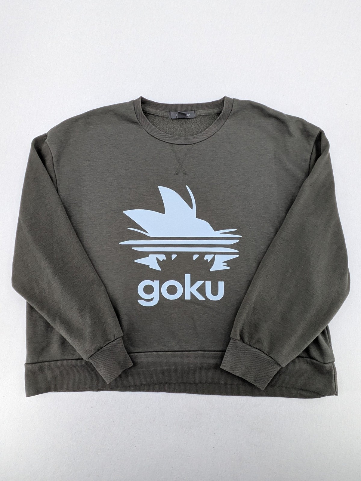 Dragon Ball Z blue sweatshirt featuring Son-Goku graphic and Primark logo.