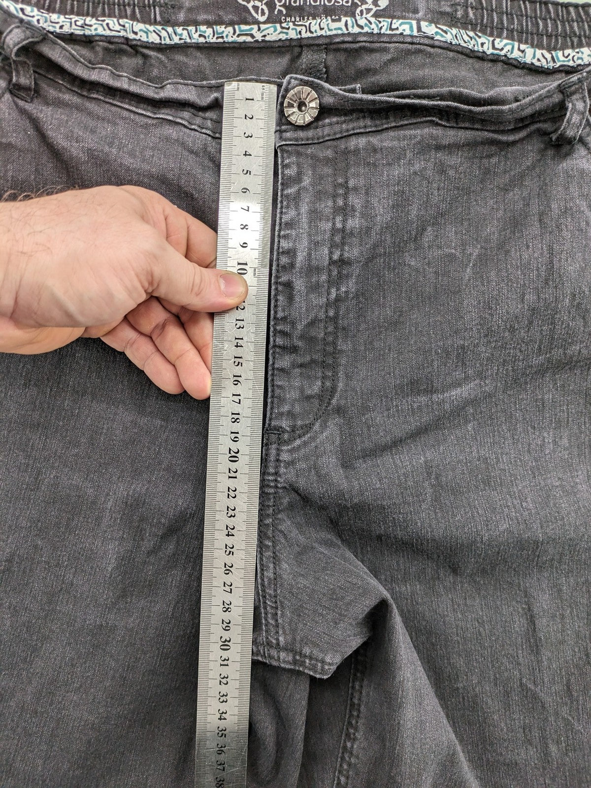 Charles Vögele grey straight jeans with elastic waistband and decorative studs on pockets.