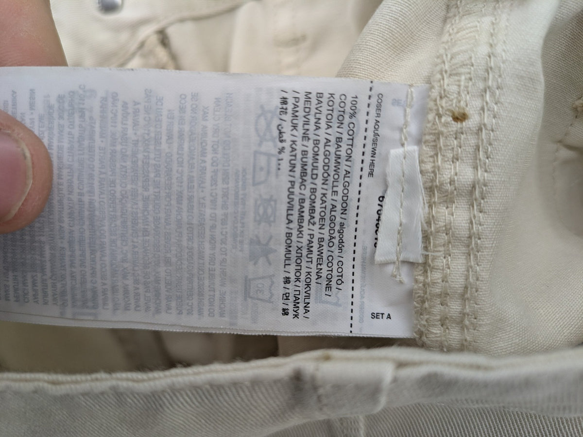 MNG beige cargo pants with straight leg, button closure, and patch pockets.
