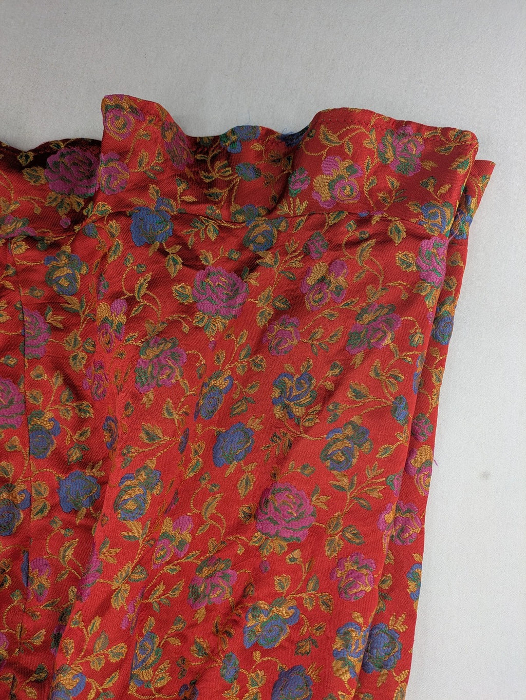 Jacquard multi A-line dress red floral jacquard pattern with matching waist tie.