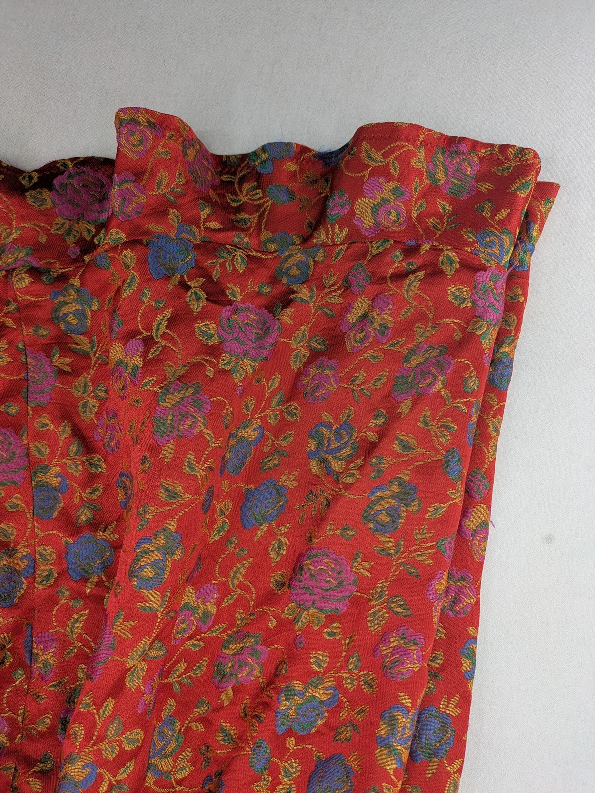 Jacquard multi A-line dress red floral jacquard pattern with matching waist tie.