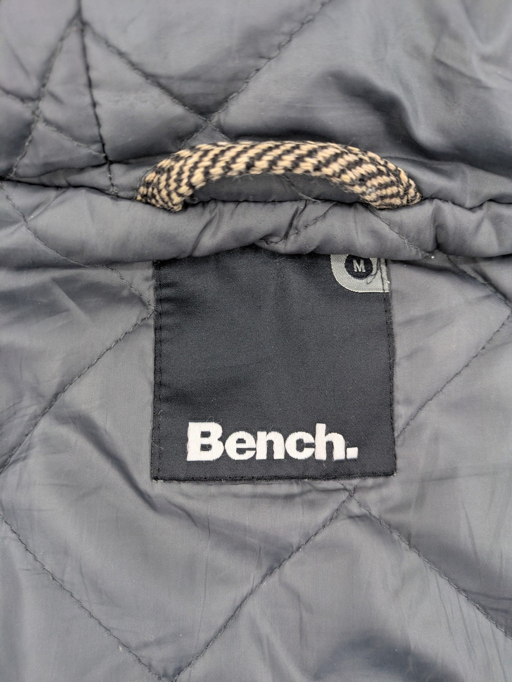 Bench beige-brown duffle coat with herringbone pattern and toggle closures.