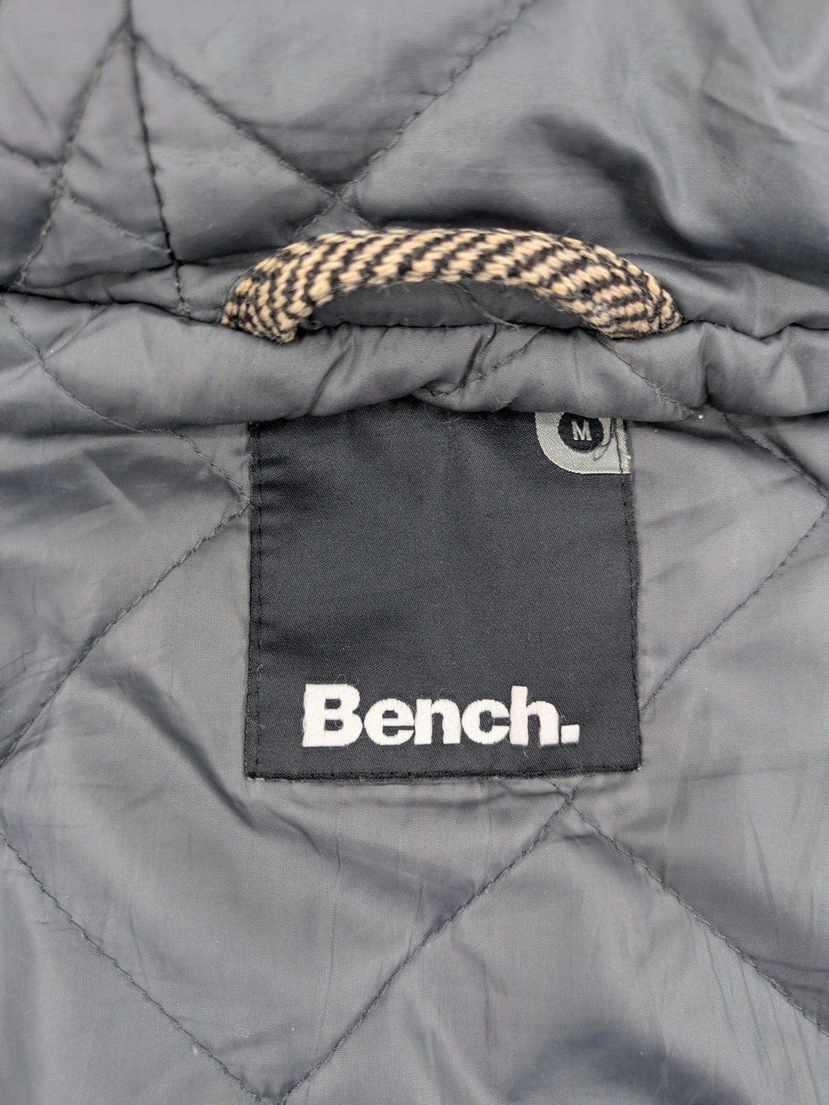 Bench beige-brown duffle coat with herringbone pattern and toggle closures.